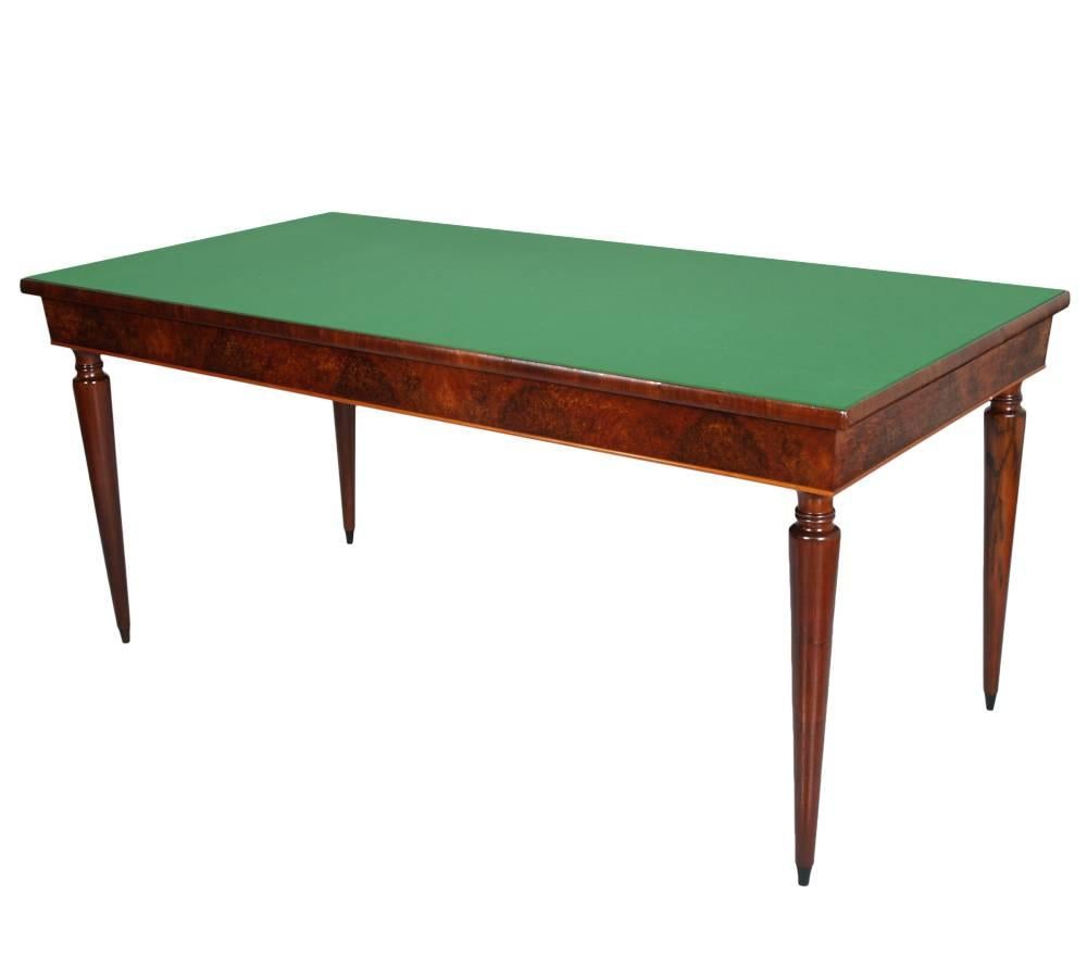 The table and chairs can be sold separately
A Paolo Buffa style 1940s Italian midcentury table by Palazzi dell'Arte Cantù., in mahogany with six chairs; emerald glass top. Chairs in original leatherette upholstery.

Measure cm:
Table H 81 x W