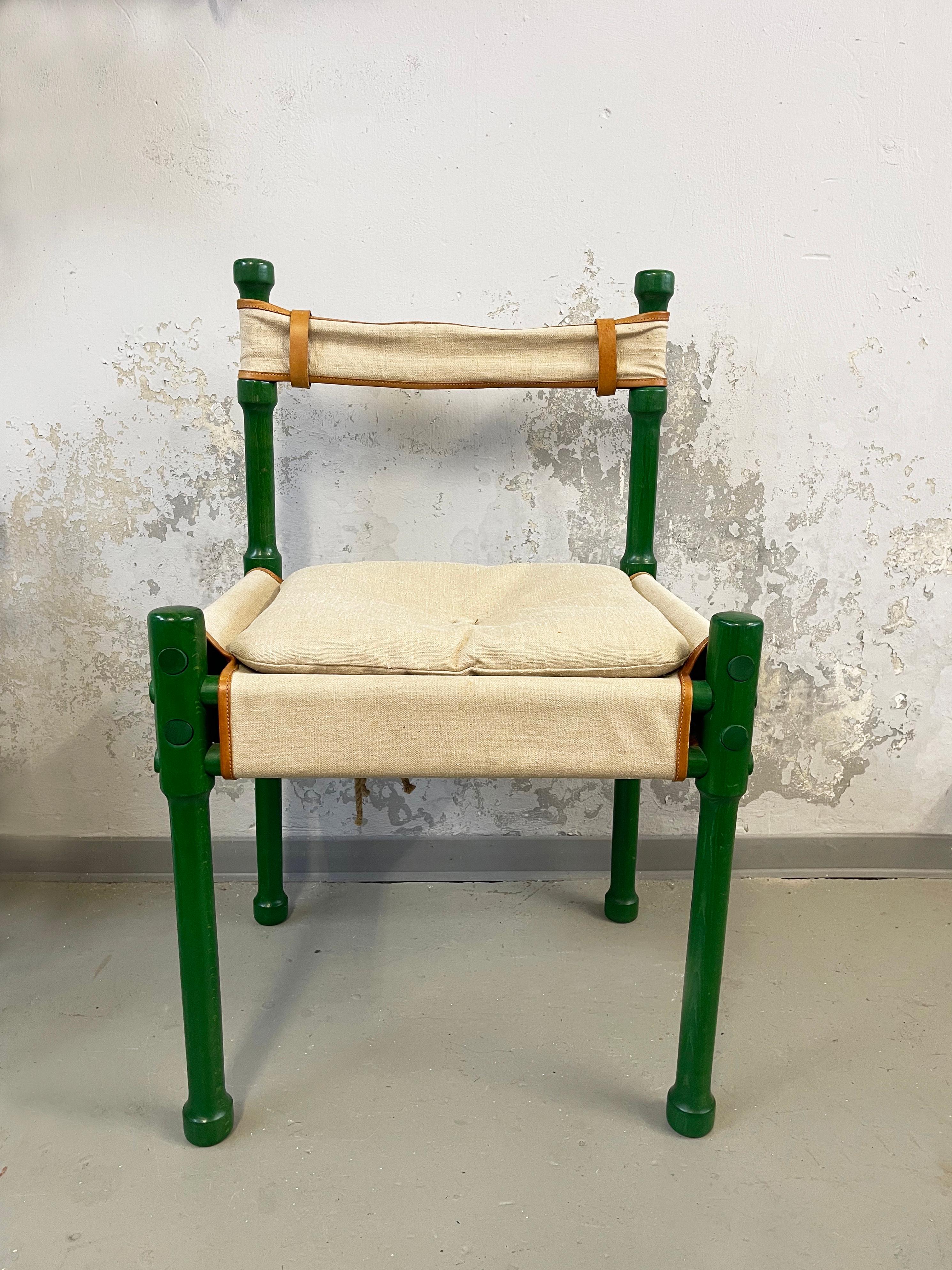 Fantastic original 1970s design, in a robust Scandinavian hunting or Safari chair style.
Quite unusual and beautiful composition of high end materials & craftsmanship indeed.
Juicy green polished wood frame with a beautifully done, round tongue and