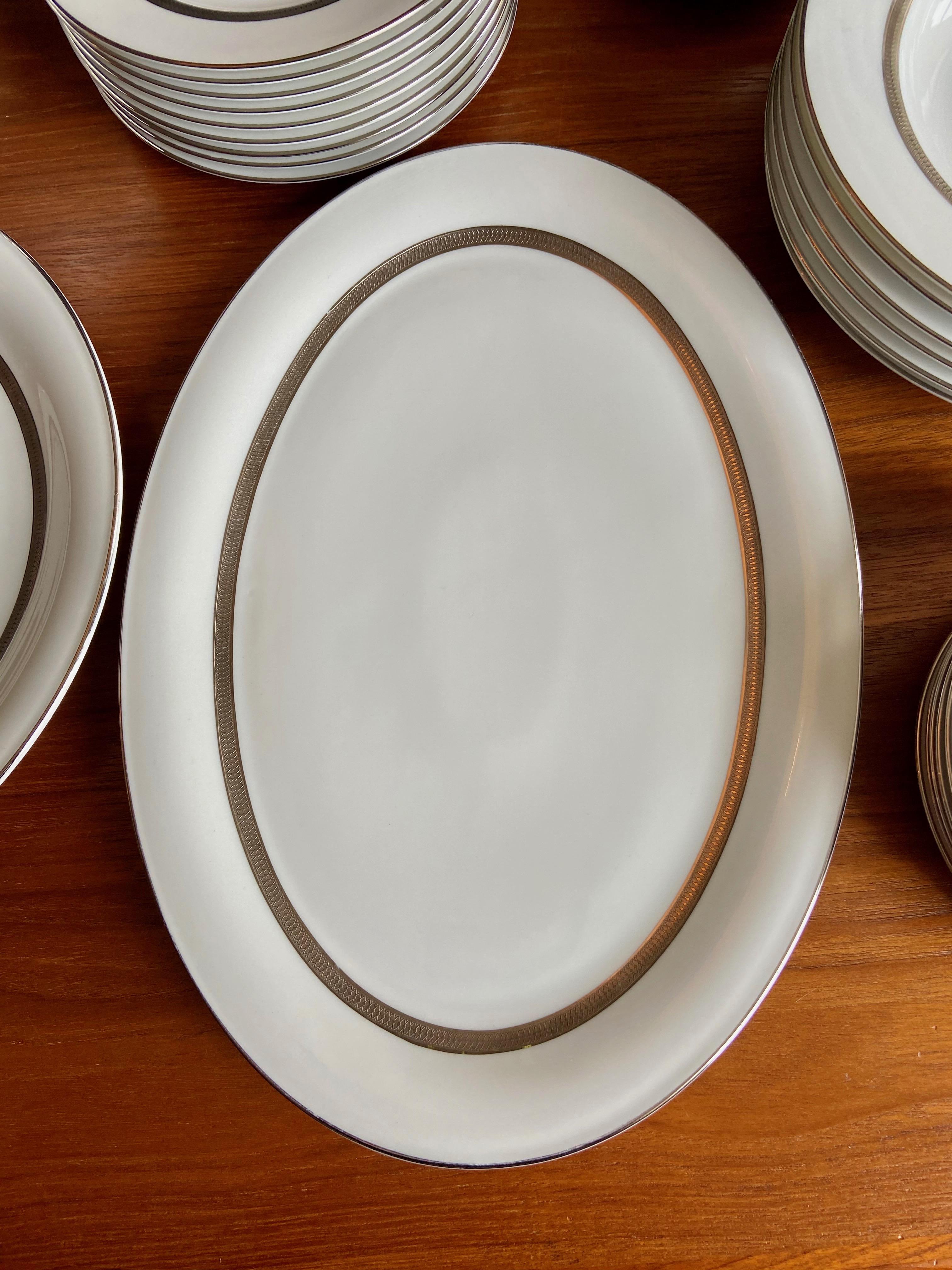 Beautiful classical dining service for six people by the German bran Tirschenreuth. This brand used to be part of the famous manufacturer Hutschenreuther. The service is made of snowy fine white porcelain and is decorated with silver coloured rims.