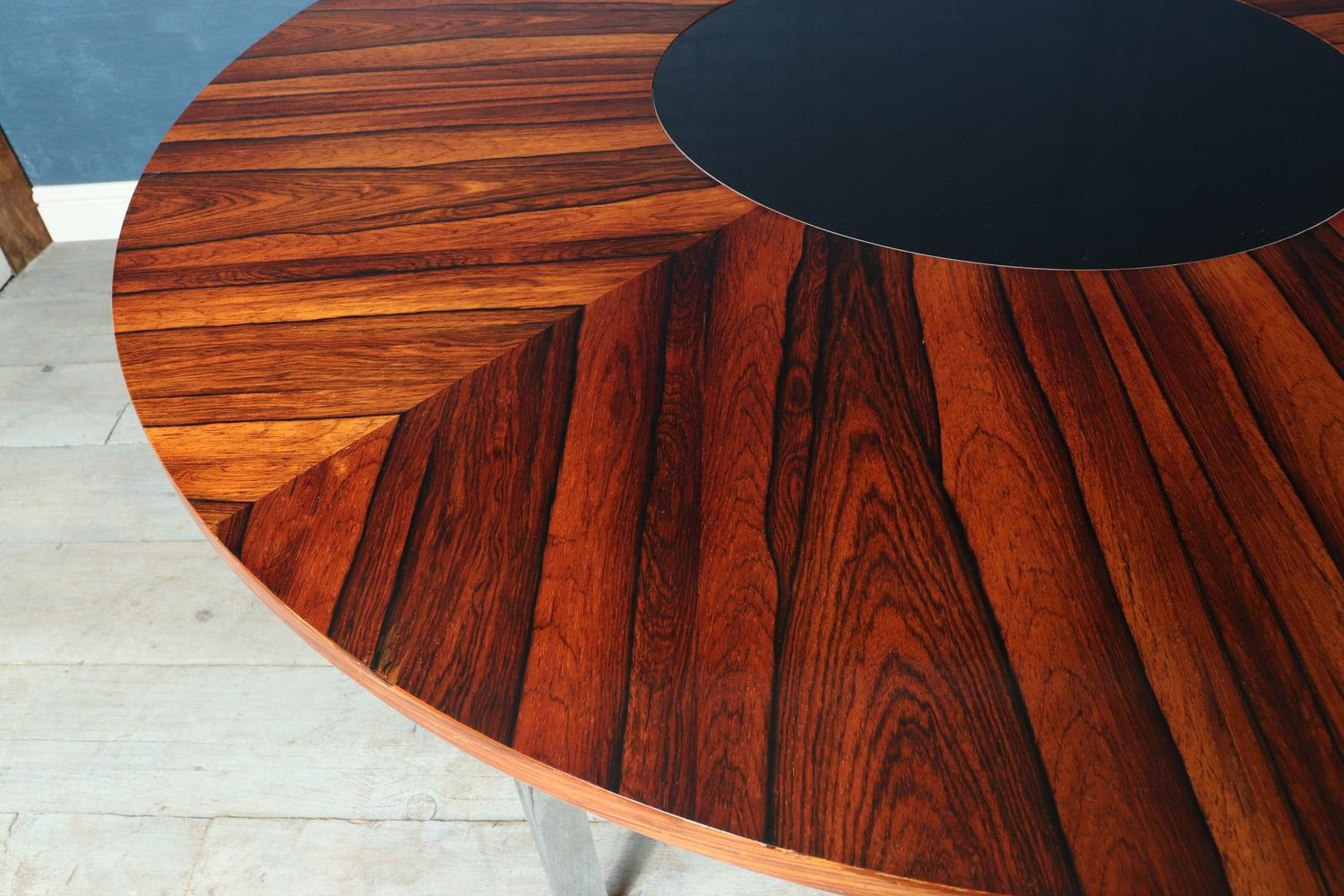 Midcentury dining table by Merrow Associates
A stunning table produced by Merrow Associates in the 1960s, this rosewood topped dining table has a black laminate lazy Suzan in the center the top has been re finished and is in excellent condition,