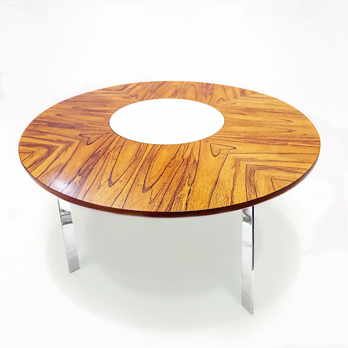 A vintage British mid century Merrow Associates Model 342R dining table in rosewood and chrome with cream melamine ‘Lazy Susan’.

Merrow Associates produced many outstanding British mid century pieces throughout the 1960’s and 70’s and stood out