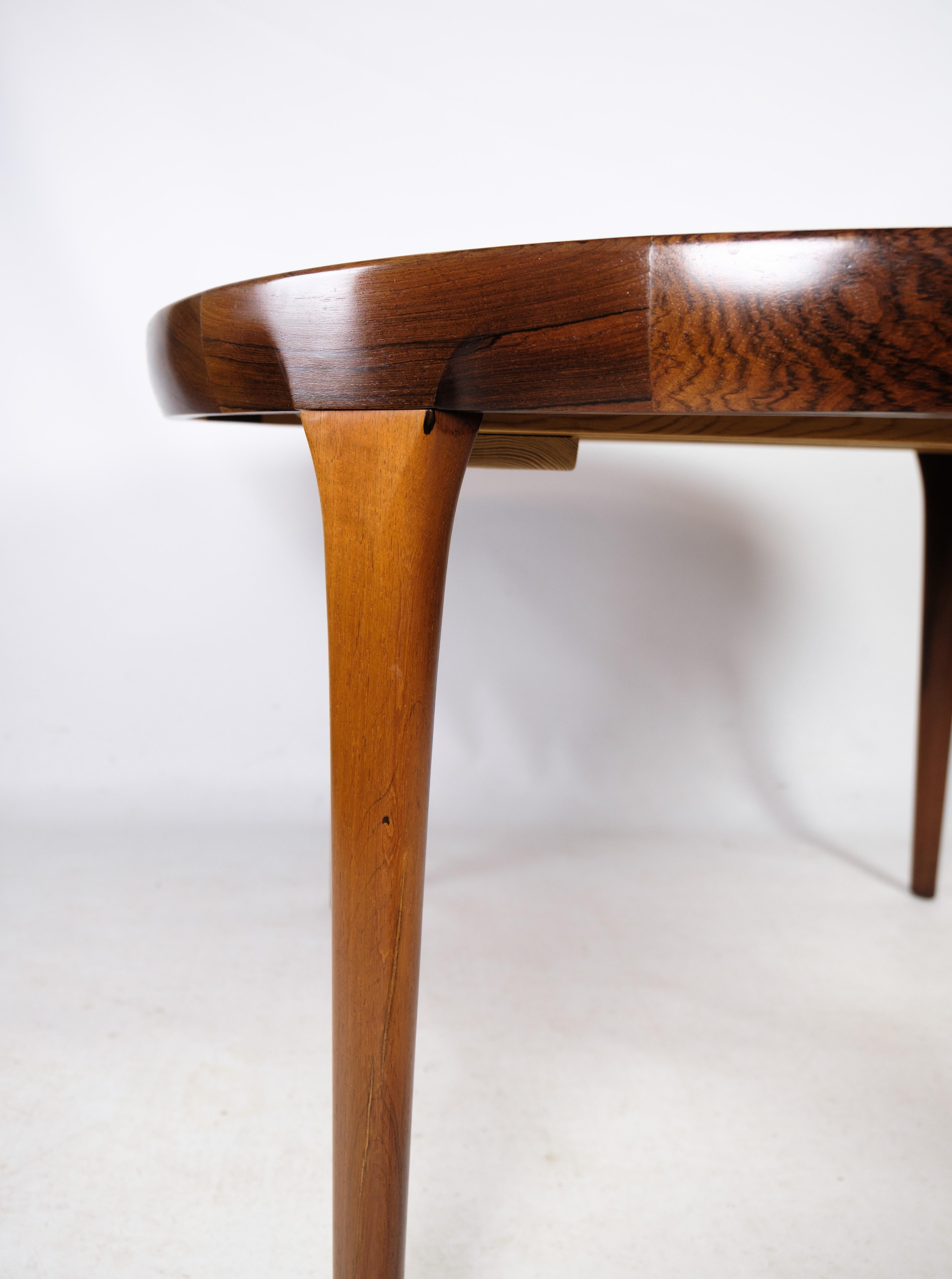 Danish Midcentury Dining Table in Rosewood by Ib Kofod Larsen for Faarup Mobelfabrik