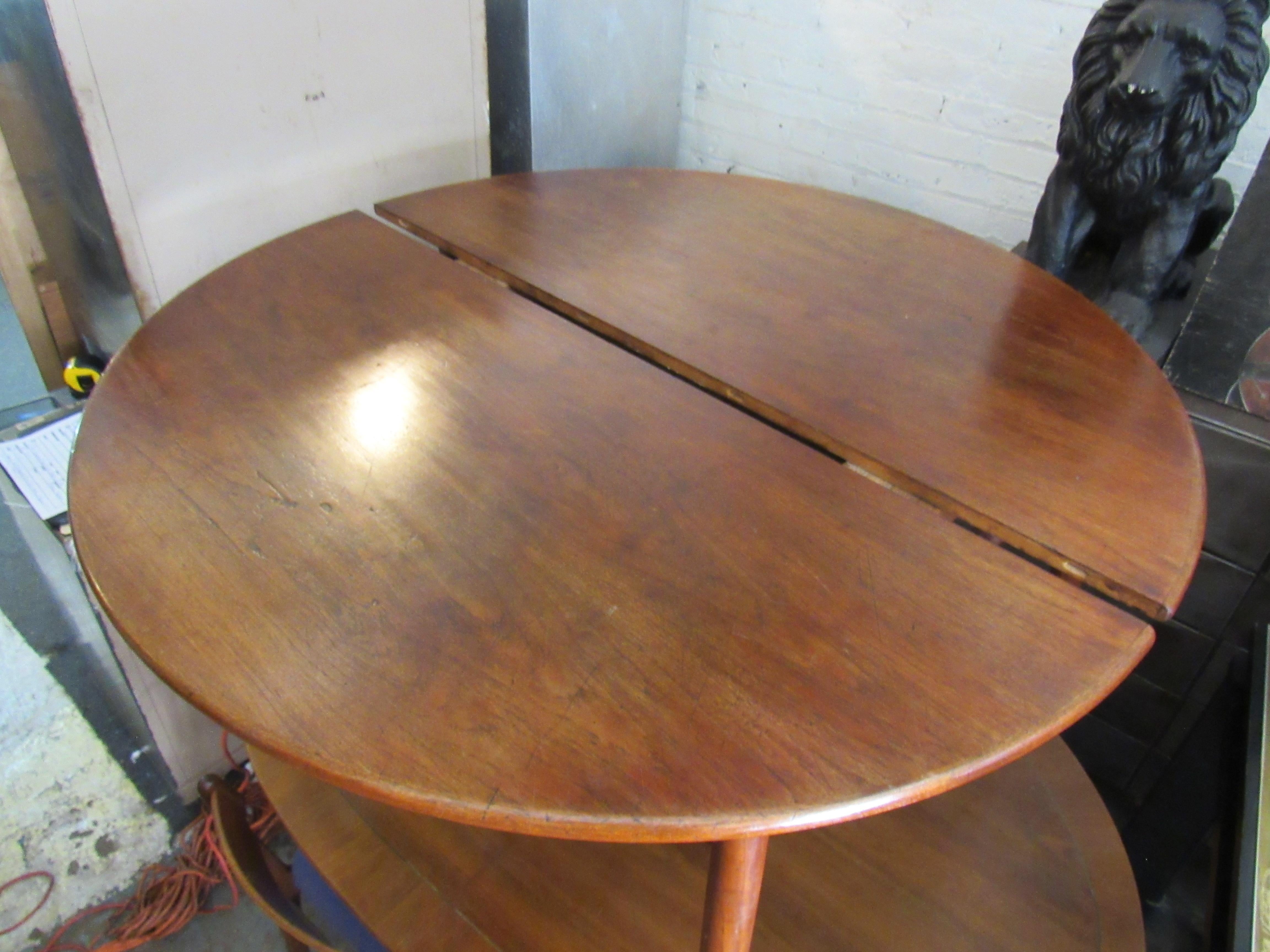 Mid-Century Modern teak dining table with a 20inch wide leaf. Classic Danish design.
(Please confirm item location - NY or NJ - with dealer).
   