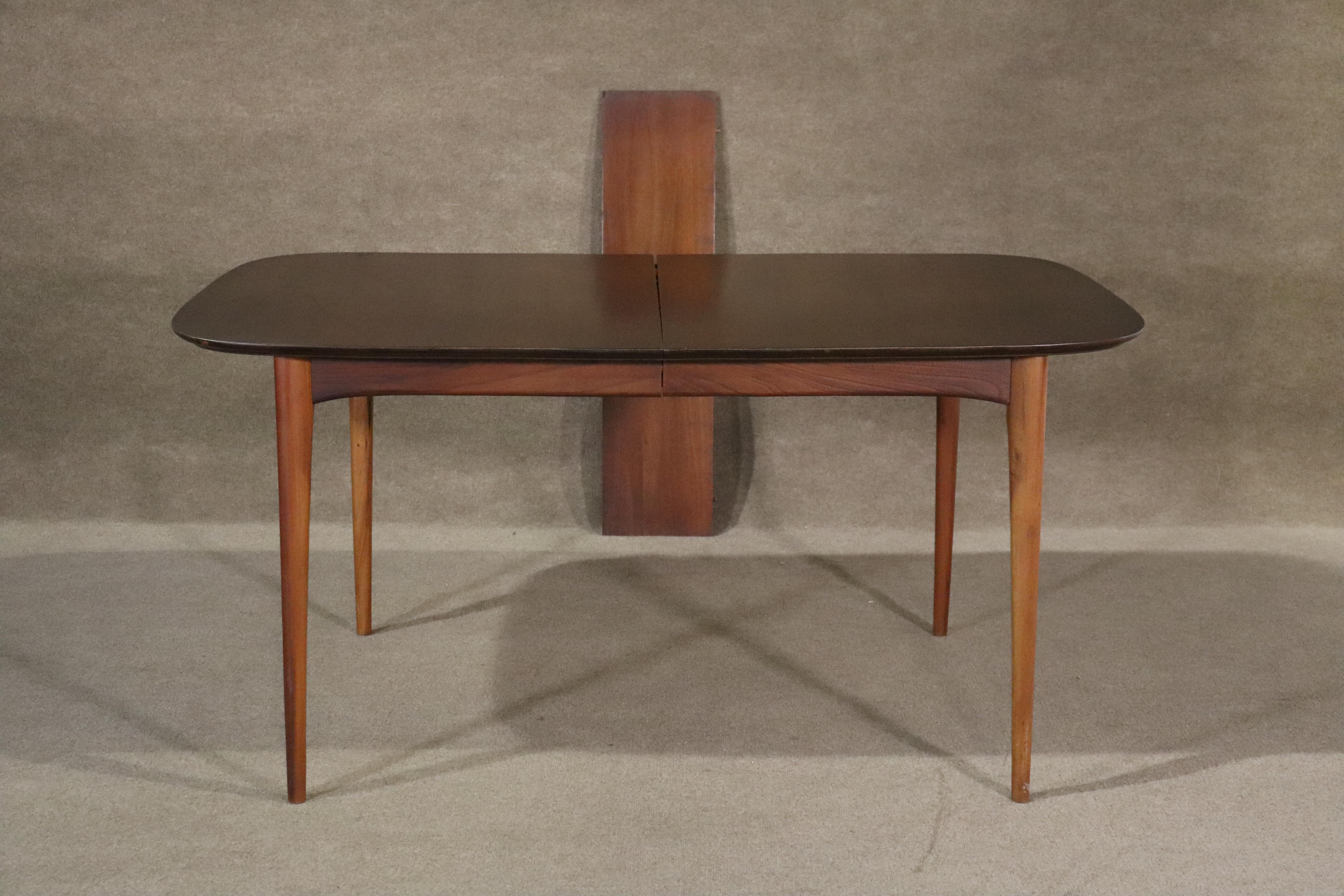 Mid-century modern rounded dining table with 10