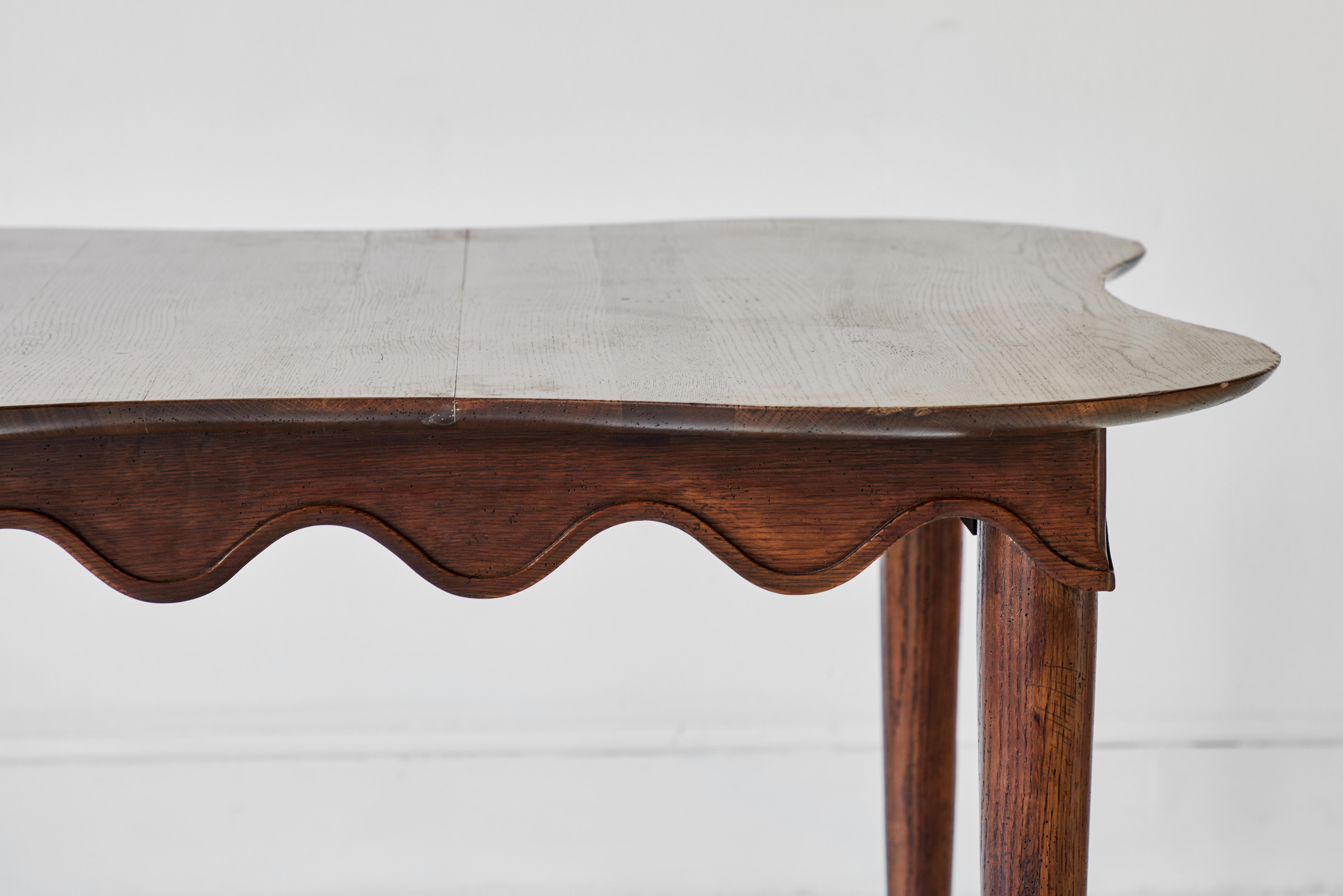 scalloped edge dining table
