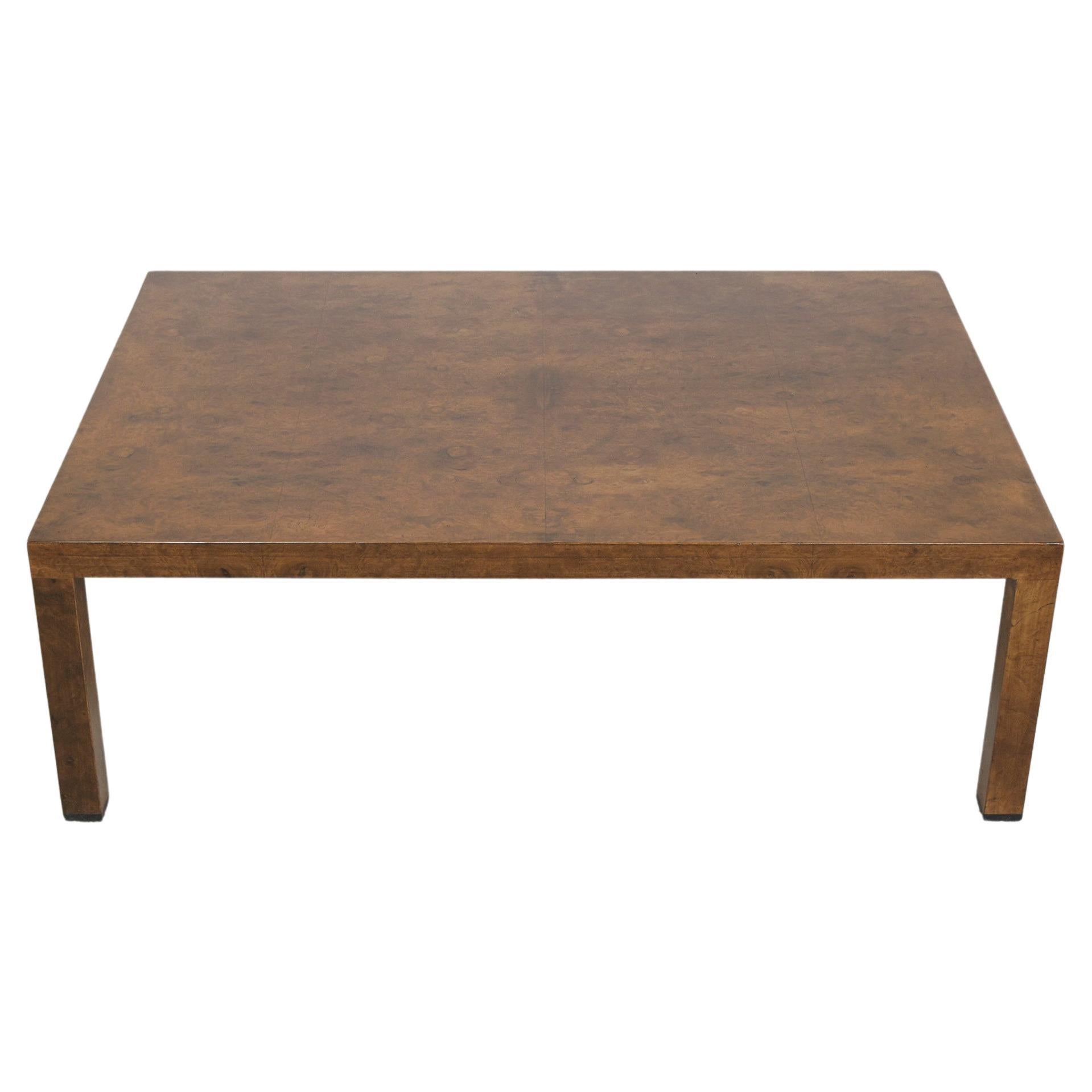 Discover the allure of classic design with our Mid-Century Modern Coffee Table from the Directional Collection, a piece that embodies the exquisite craftsmanship of the 1970s. This table, handcrafted from solid wood and adorned with rich veneer, is