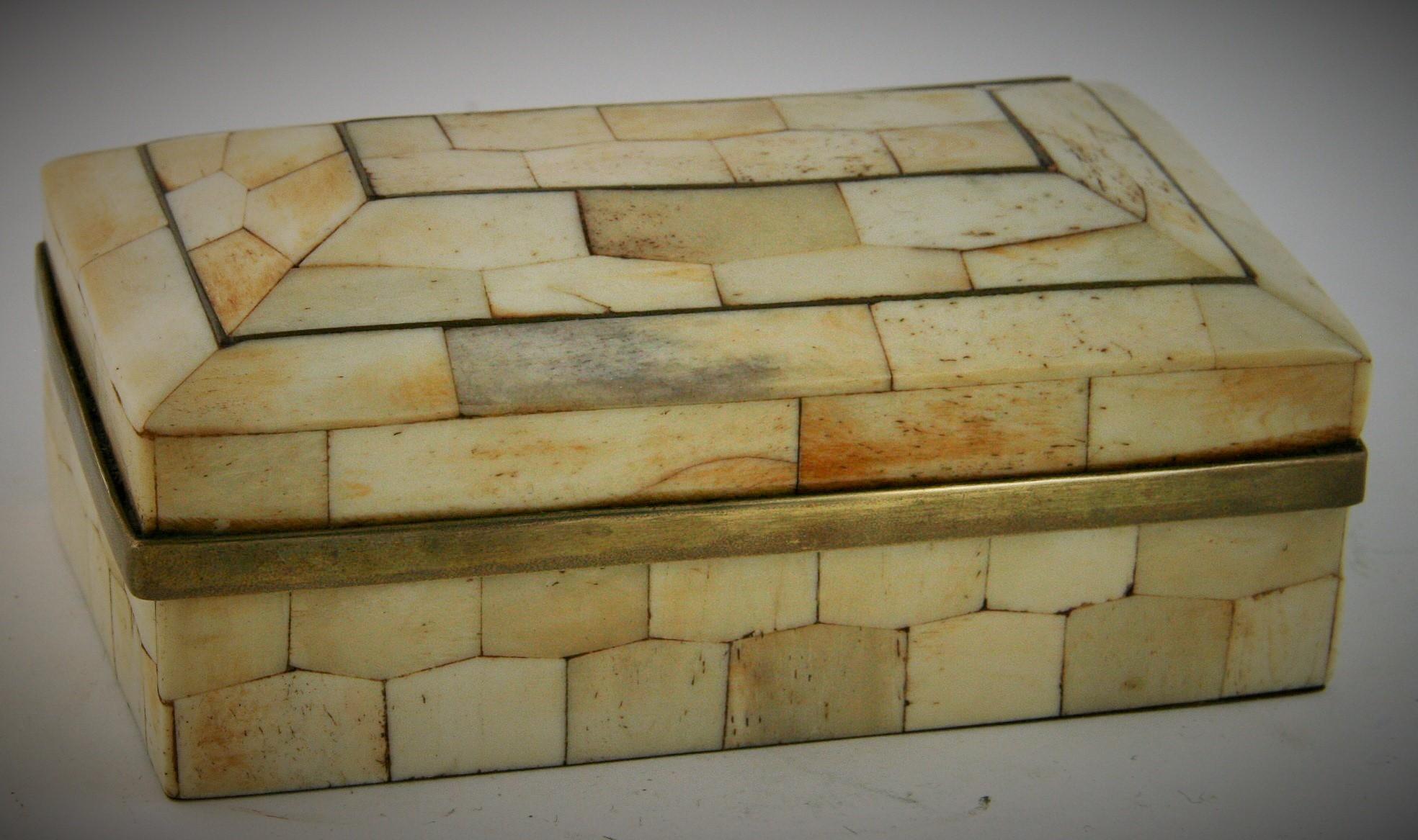 8-245 stone and brass over wood domed top geometric cut stone with brass interior and bottom.