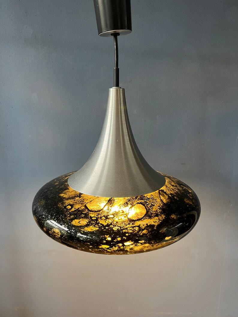 Very rare mid century glass pendant lamp by Doria Leuchten. The lamp has a beautiful cone shape. The addition of the black swirling texture introduces an element of modernity and visual interest to the design. The subtle swirl pattern adds depth and