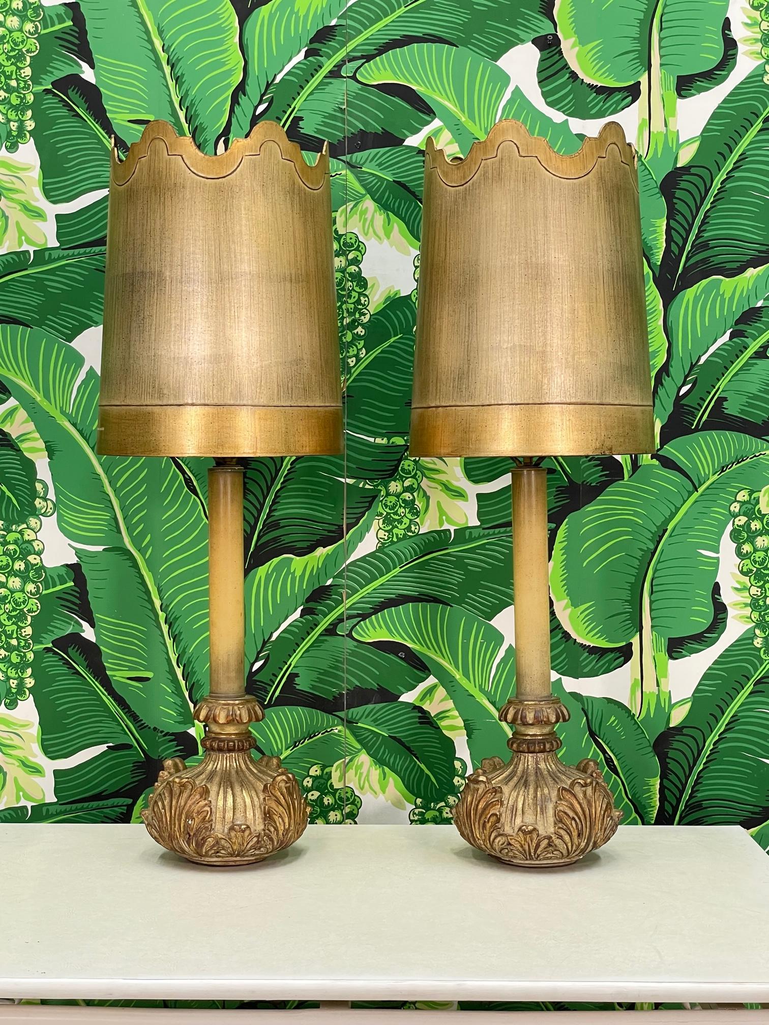 Pair of mid century table lamps feature style very similar to Dorothy Draper's iconic aesthetic with their botanical molded plaster bases and shapely cut shades. Good condition with minor imperfections consistent with age, see photos for condition
