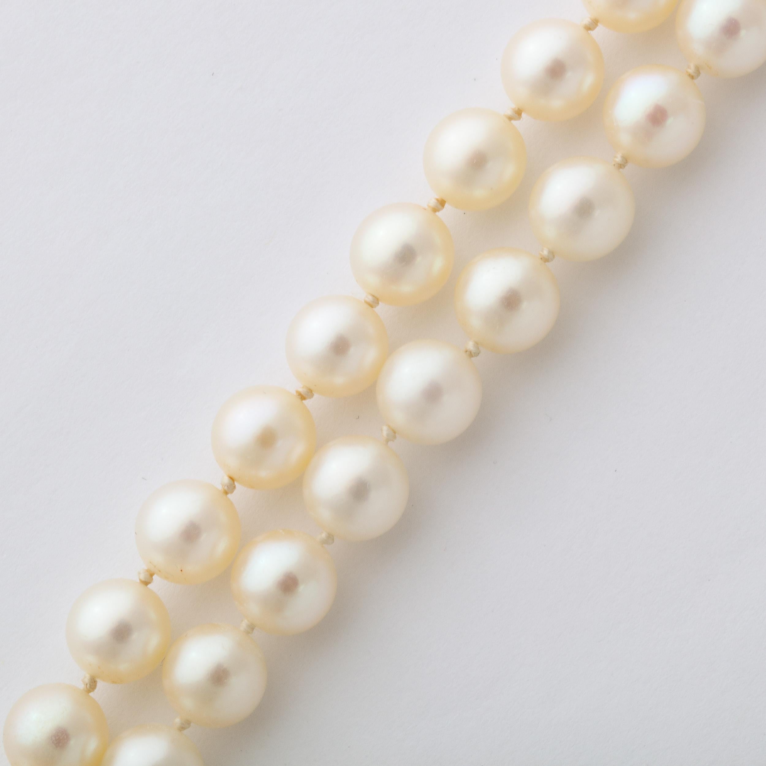 Women's or Men's Mid Century Double Strand Pearls with Diamond Clasp For Sale