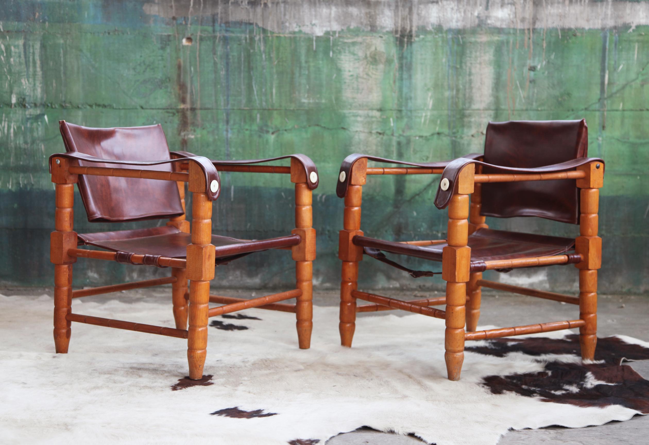 Sold here as a pair.

For sale here is a gorgeous pair of sculptural safari chairs imported from Africa in the 60's by our client who was an avid collector. These are hand carved versions of the safari chair modeled after the Scirocco Safari Chair