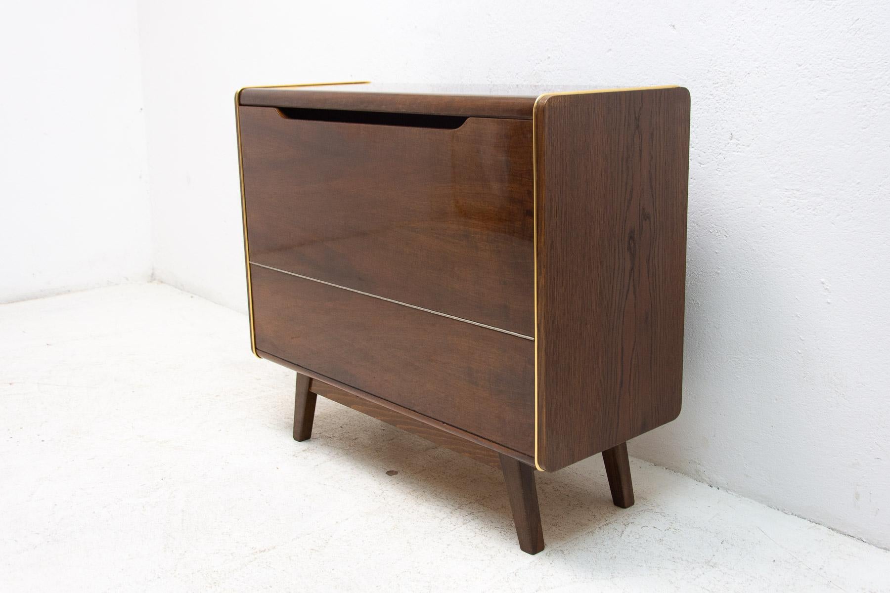 Mid century dresser designed by Hubert Nepožitek & Bohumil Landsman for Jitona in the 1970´s.
It was made as a part of living room sector model U-372386. Made in Czechoslovakia.
In very good Vintage condition, showing slight signs of age and
