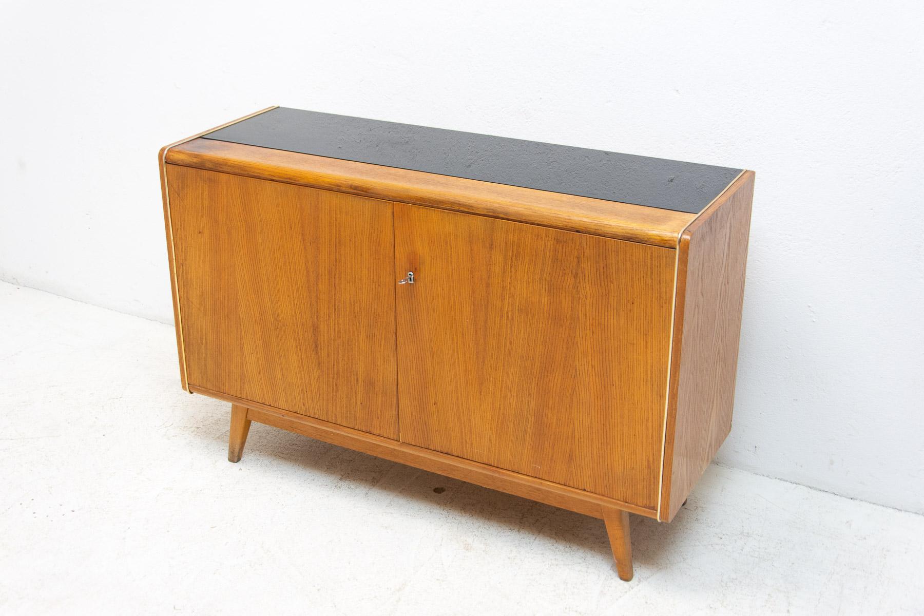 Mid-century dresser designed by Hubert Nepožitek & Bohumil Landsman for Jitona in the 1970´s.
It was made as a part of living room sector model U-372386. Made in Czechoslovakia.
In good preserved Vintage condition, showing signs of age and