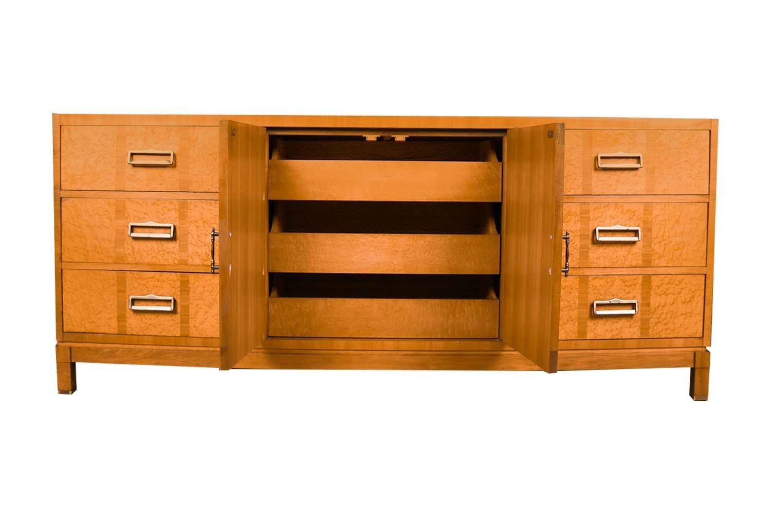 Extraordinary Mid-Century Modern “Diamond front” credenza dresser circa 1960's. This beauty features a unique geometric diamond frieze pattern on the rectangle top and center cabinet doors, in warm natural pecan tones. The double cabinet doors in