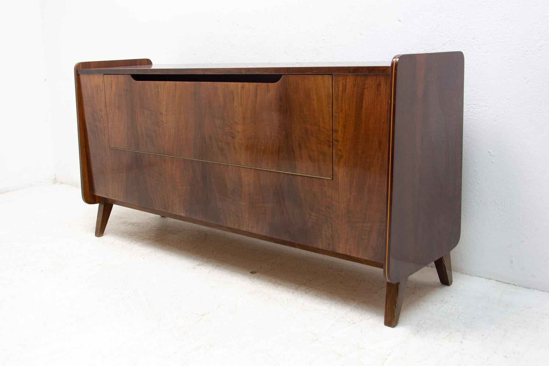 Vintage dresser from the 60s of the last century. Made in Czechoslovakia, designed by the famous Czechoslovak architect František Jirák for Tatra nábytok. In very good Vintage condition, showing signs of age and using. Beautiful walnut