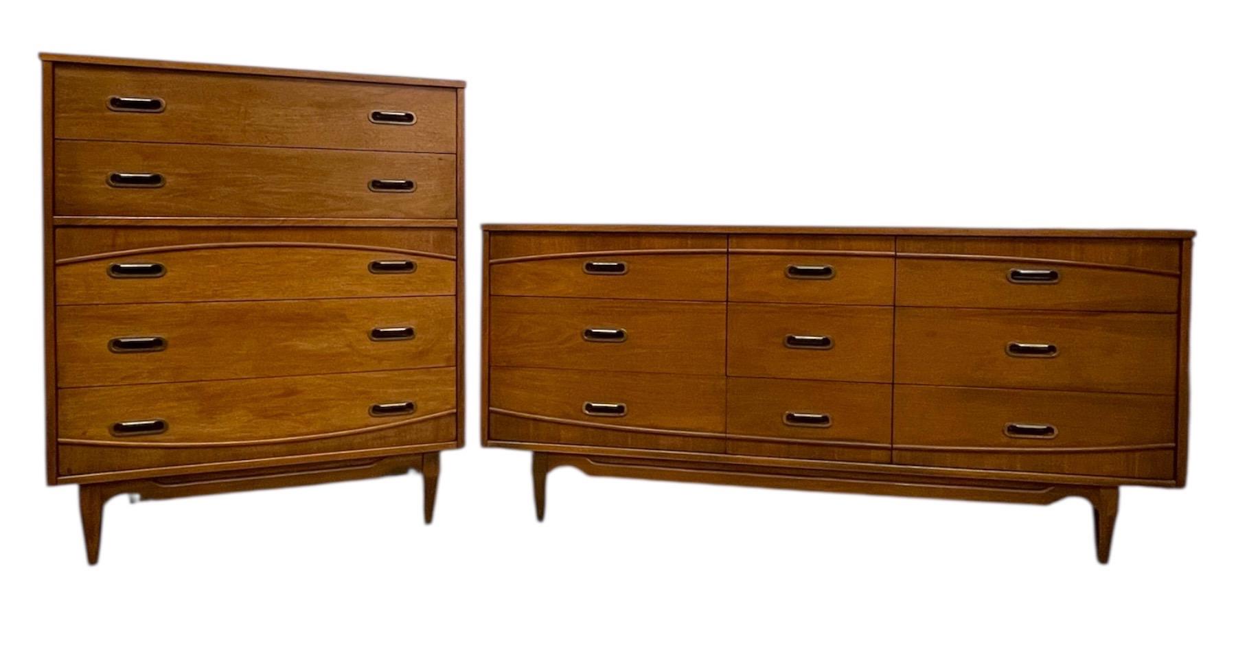 Offered as a matching set, this mid-century modern dresser pair was made by Hooker Furniture, a well-known American manufacturer recognized for its quality craftsmanship and classic MCM case goods. Both  places retain their branded maker's mark