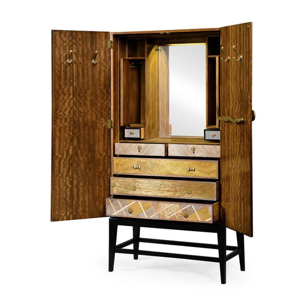 This midcentury dressing armoire is an homage to 1950s modern and personifies chic with its nouveau weathered tartan exterior, which opens to matching color blocked drawers, and custom cast buttons, bows, and earring inspired pulls! The interior