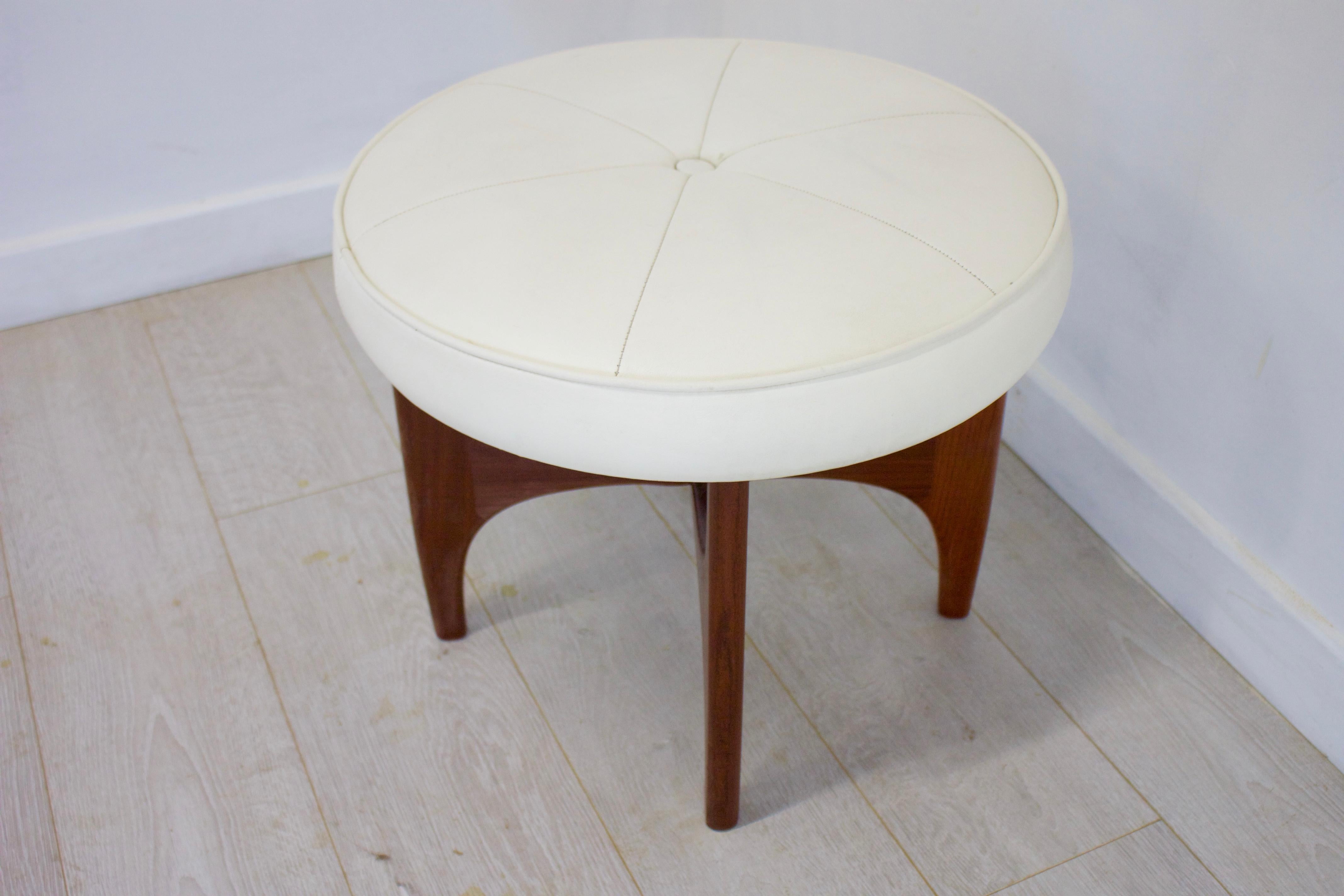 - Midcentury dressing table stool
- Made in the UK by G Plan
- Made from teak and white vinyl.