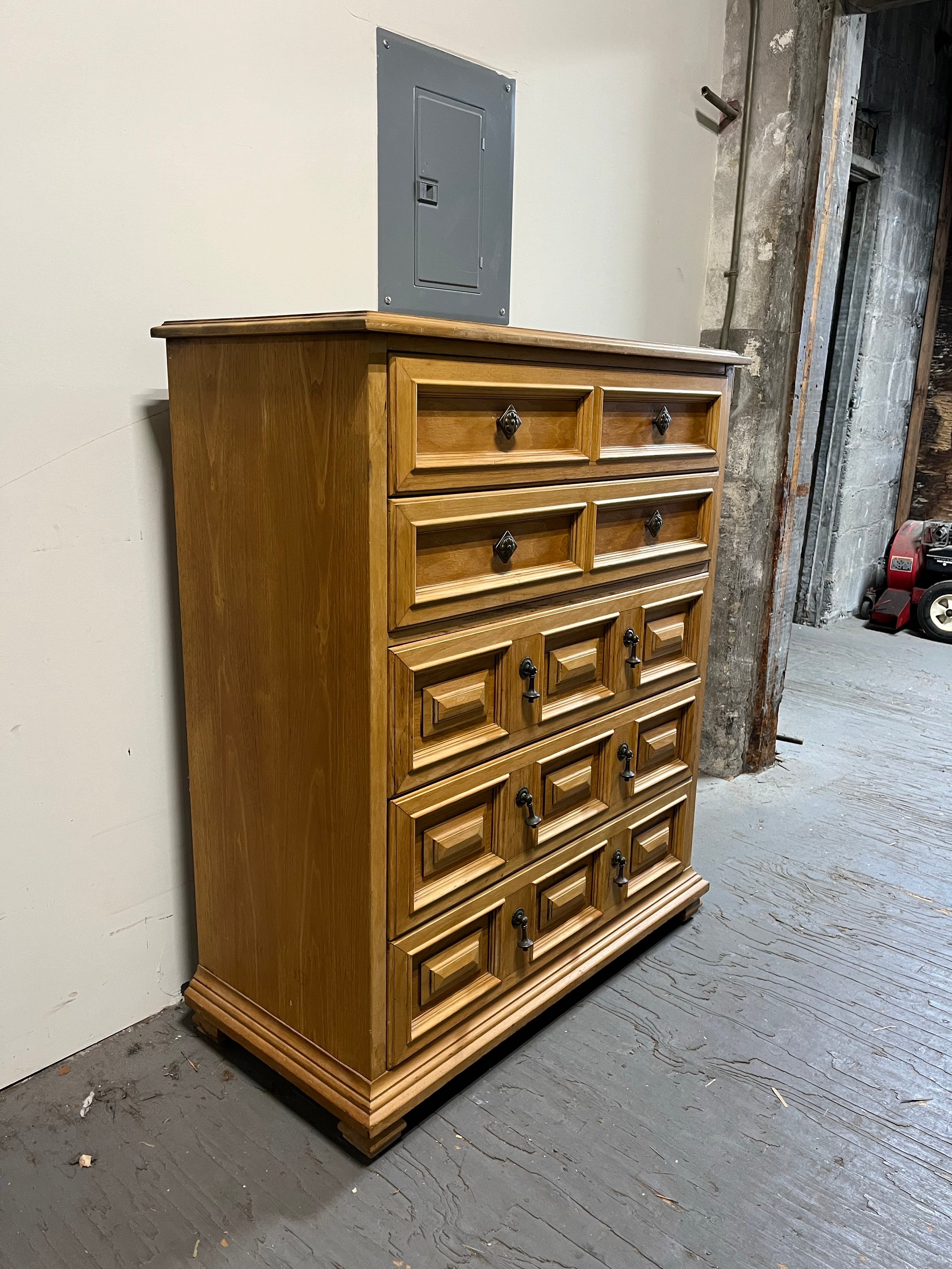 Highly sought after Spanish Mediterranean, Esperanto, vintage Drexel Dresser. Oak, solid-wood craftsmanship boasts 5 large dovetailed drawers for ample storage. Drawers feature the beautiful, highly decorated, original Esperanto brass pulls. The top