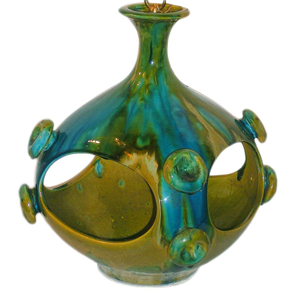 A Italian drip-glazed porcelain lantern with blue and green tones and internal light, circa 1960s.

Measurements:
Height: 16?
Diameter: 12?