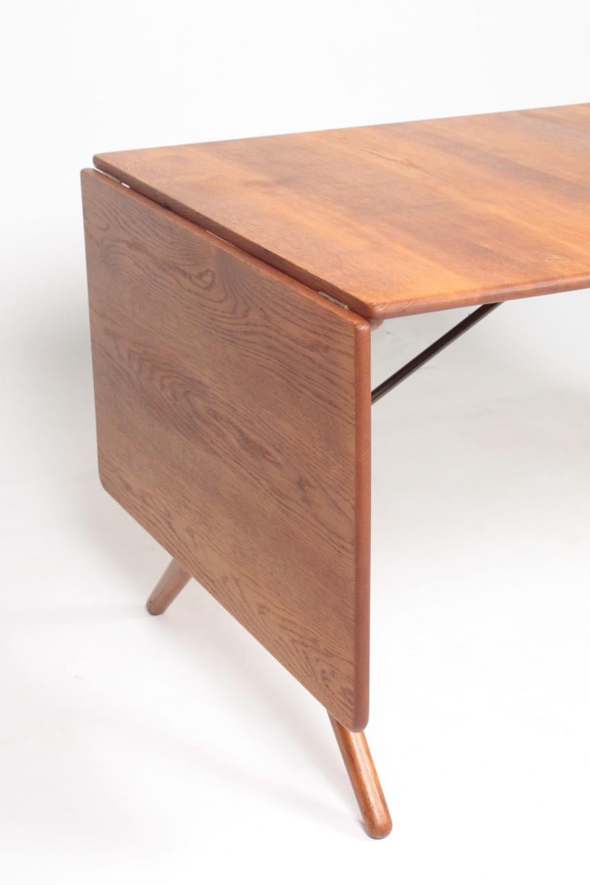 Scandinavian Modern Midcentury Drop-Leaf Table in Solid Oak Model AT-309 by Hans Wegner, 1950