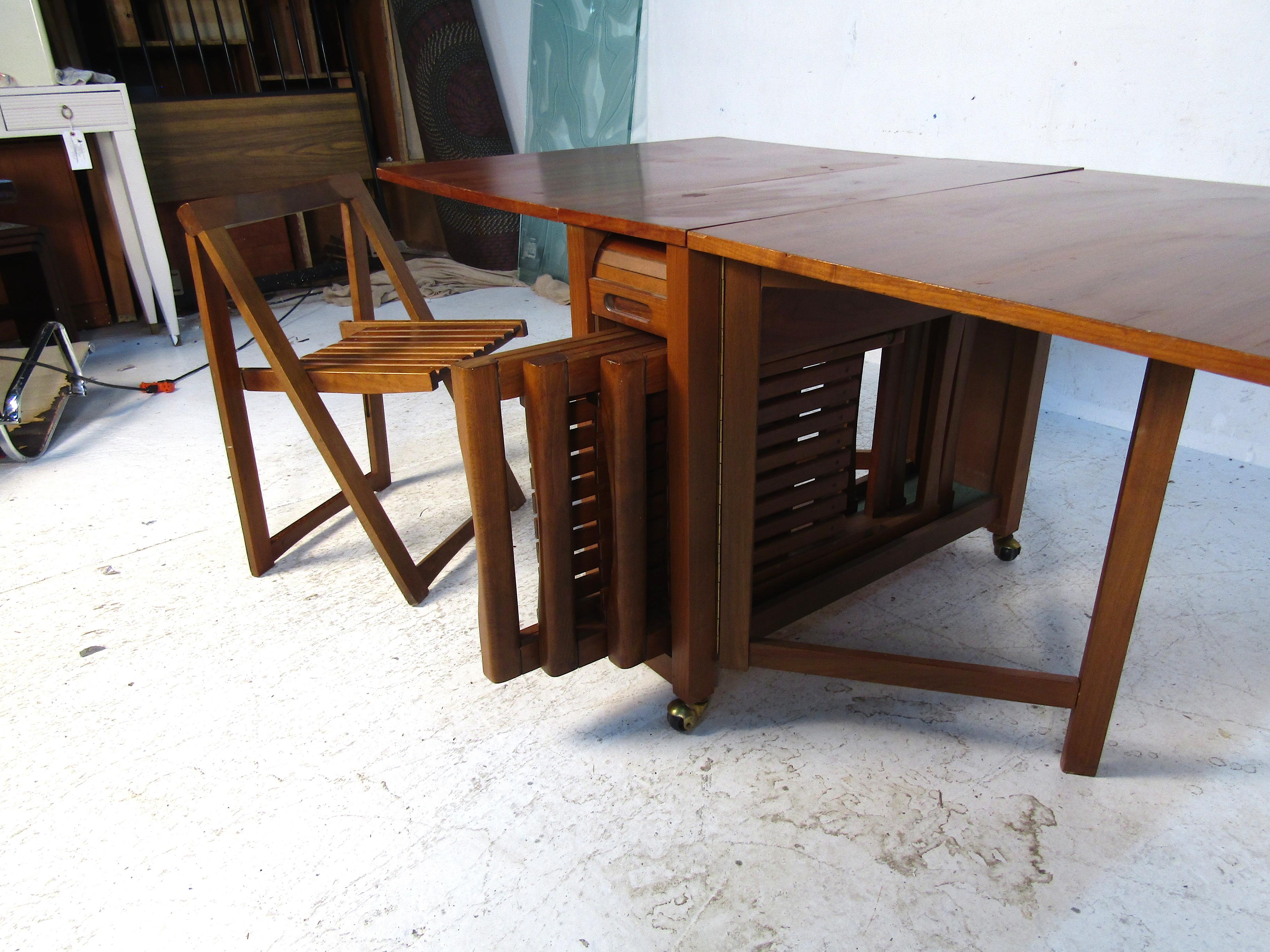 20th Century Midcentury Drop-Leaf Table with Storable Matching Chairs