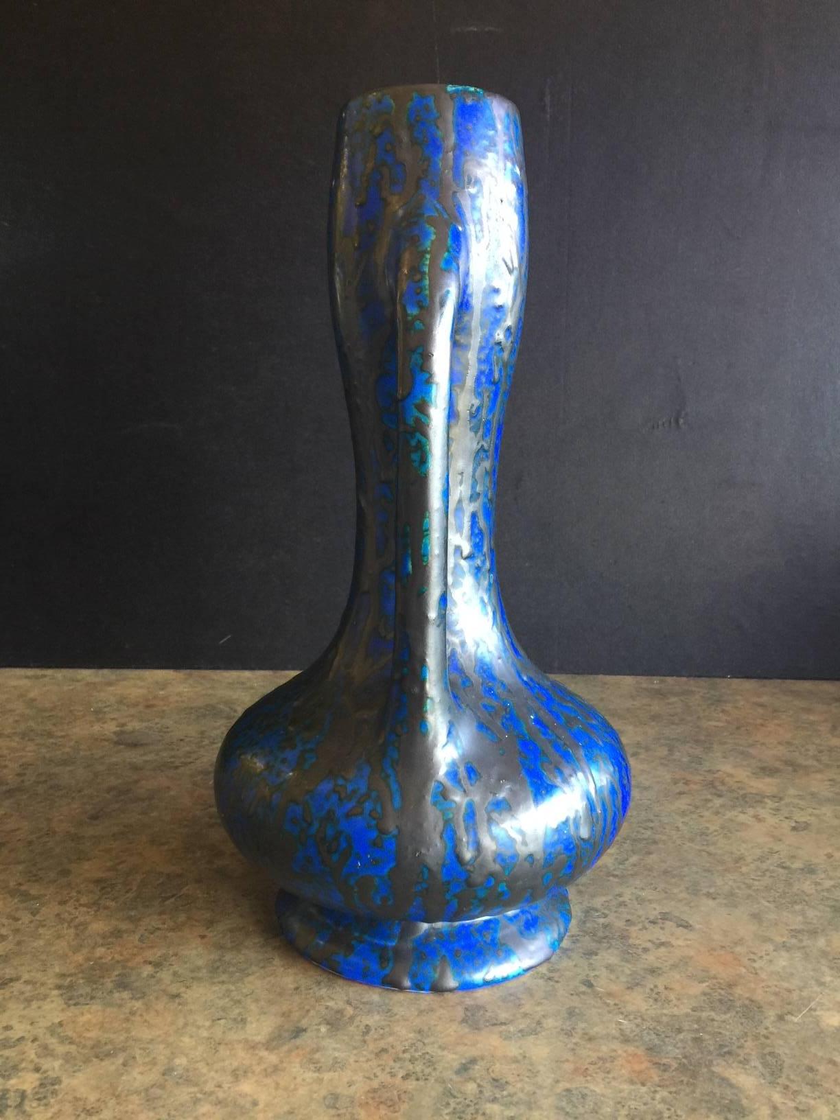 Stunning midcentury dual handled lava glazed vase by Ceramique de Bruxelles of Belgium, circa 1960s.