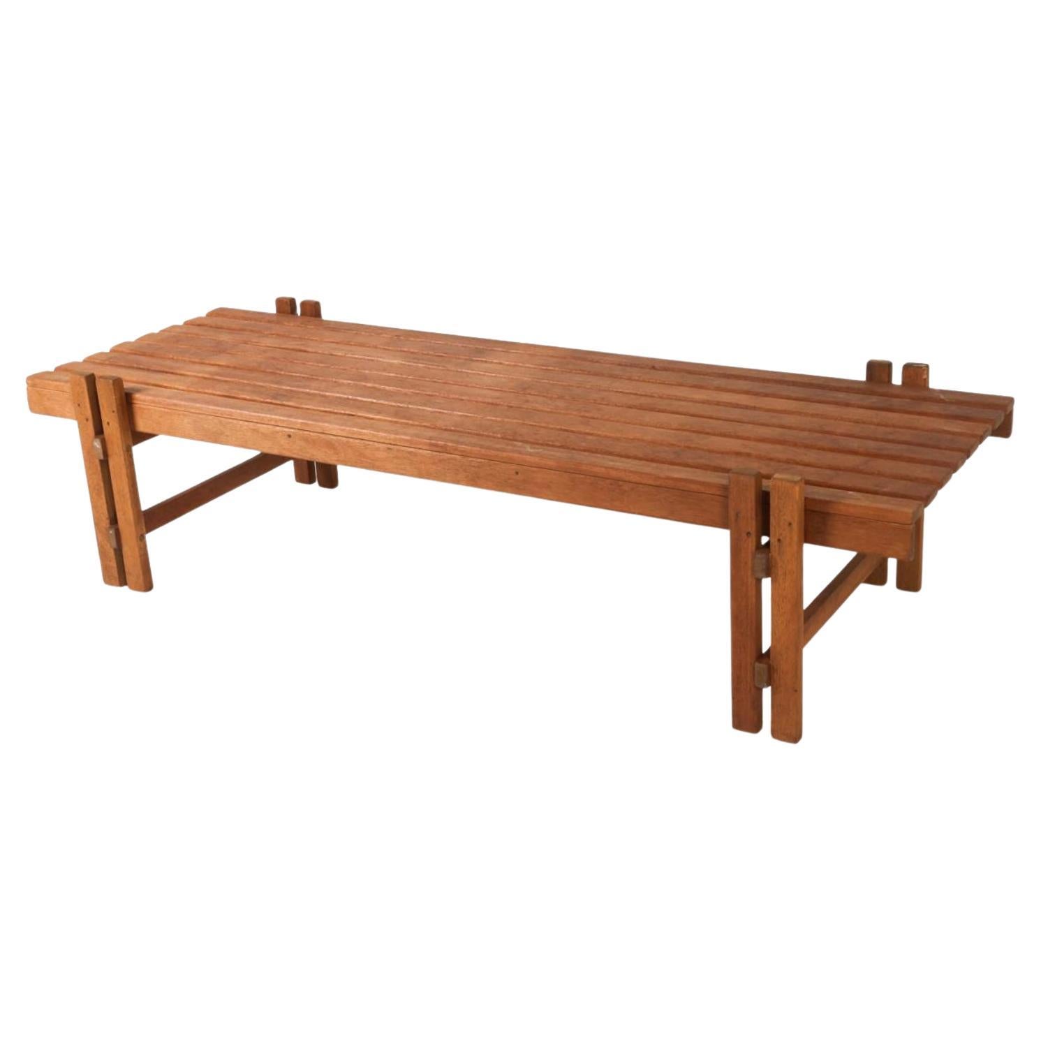 Rare Dutch Modern Solid Large teak Brutalist Slatted bench. Nice solid wood Bench great Dutch woodworking. Great for entryway hallway or bedroom. Shows normal wear from use and age. Ready for use. Made in the Netherlands. 

Pick up in Brooklyn NYC