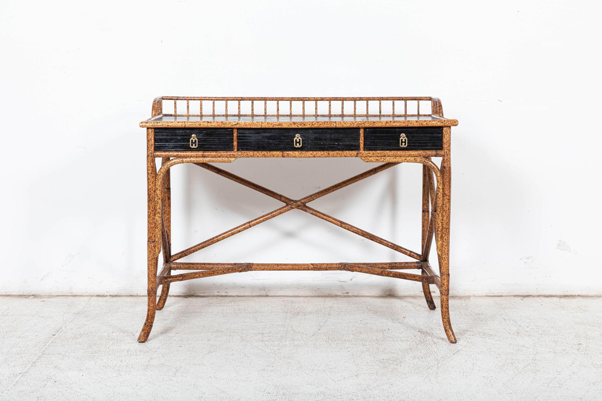 Circa 1960
Mid Century ‘E Murio’ Bamboo Campaign Desk, signed inside drawer.
Hollywood Regency Style Rattan & Black Lacquer.
Excellent form, quality & colour
sku 1082
W105 x D58 x H81 cm