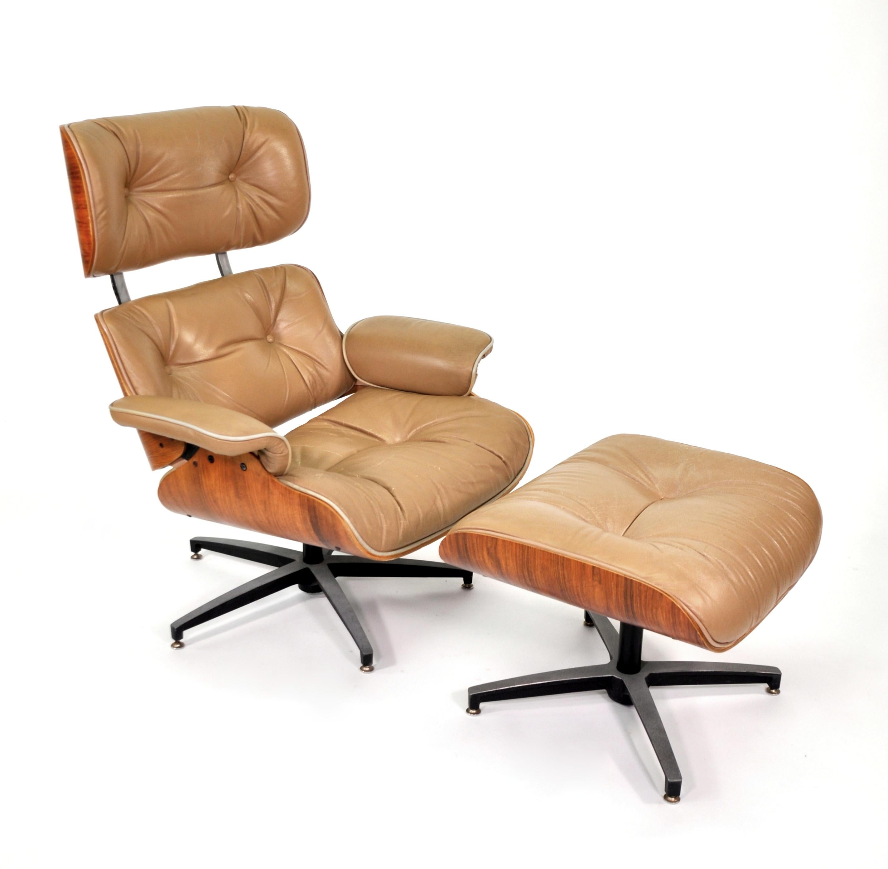 Vintage Mid-Century Modern tan leather Eames style lounge and stool, by Frank Doerner for Selig, dating from the 1960s. The swivel armchair tilts or reclines, and is very comfortable, the footstool is fixed. They feature walnut bentwood shells with