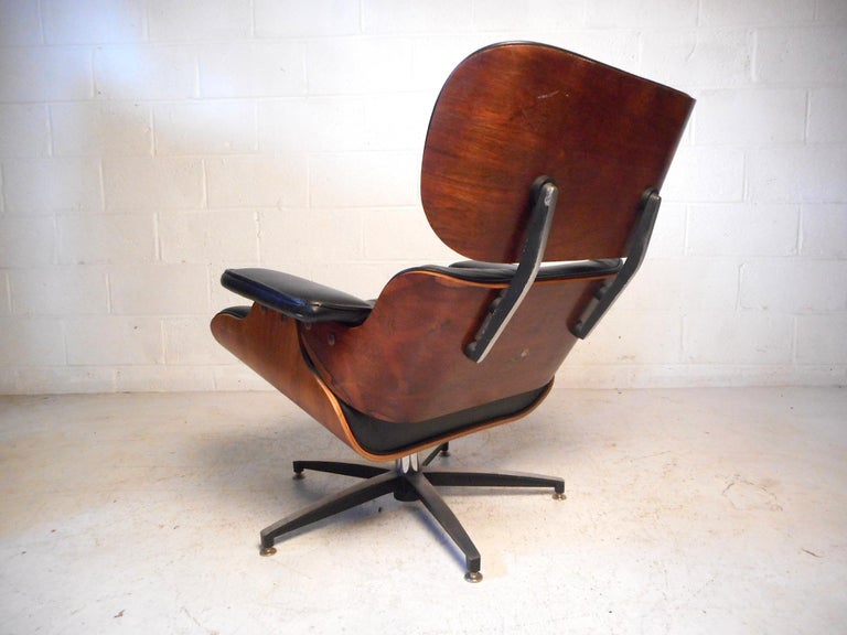 Midcentury Eames Style Swivel Lounge Chair and Ottoman at 1stDibs mid