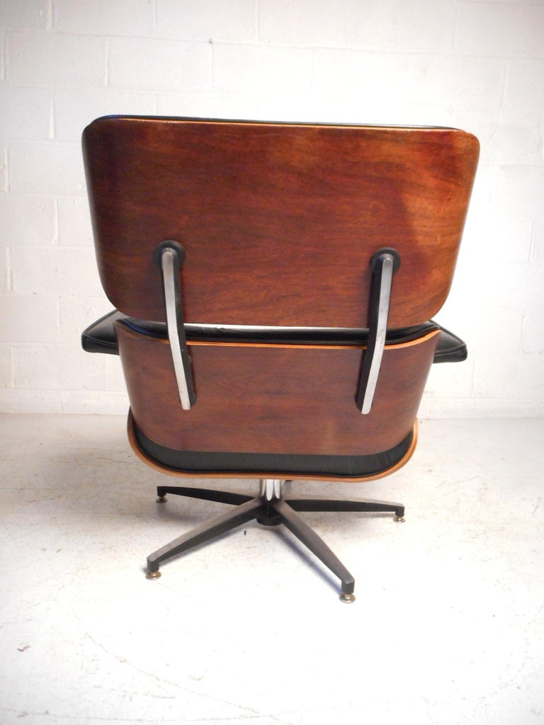 Midcentury Eames Style Swivel Lounge Chair and Ottoman at 1stDibs mid