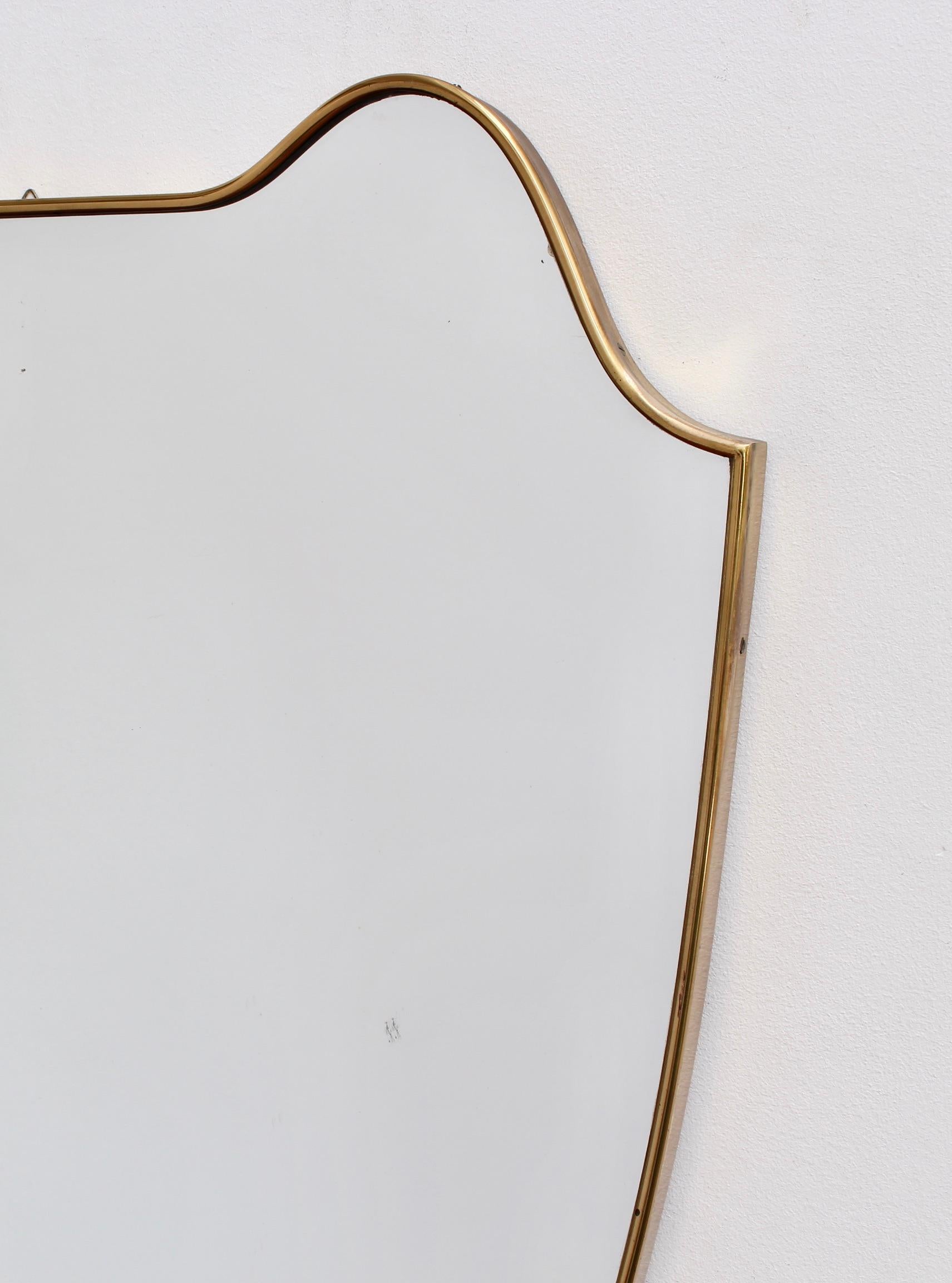 Mid-20th Century Midcentury Eared Crest-Shaped Italian Wall Mirror with Brass Frame, circa 1950s