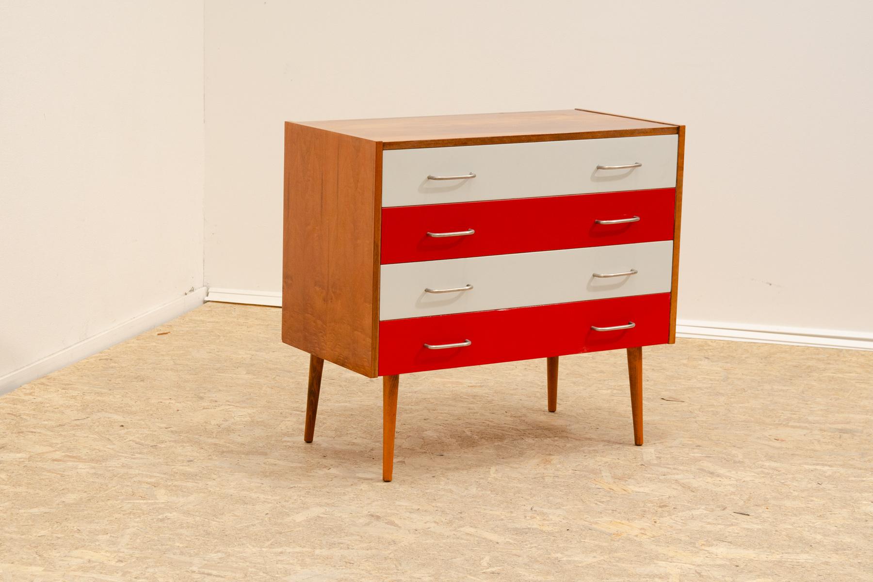 Very interesting mid century modern chest of drawers was made in the former Czechoslovakia in the 1970´s.

It´s made of walnut and beech wood and plywood.

The chest is in good Vintage condition, showing signs of age and using.

Height: 75 cm
Width:
