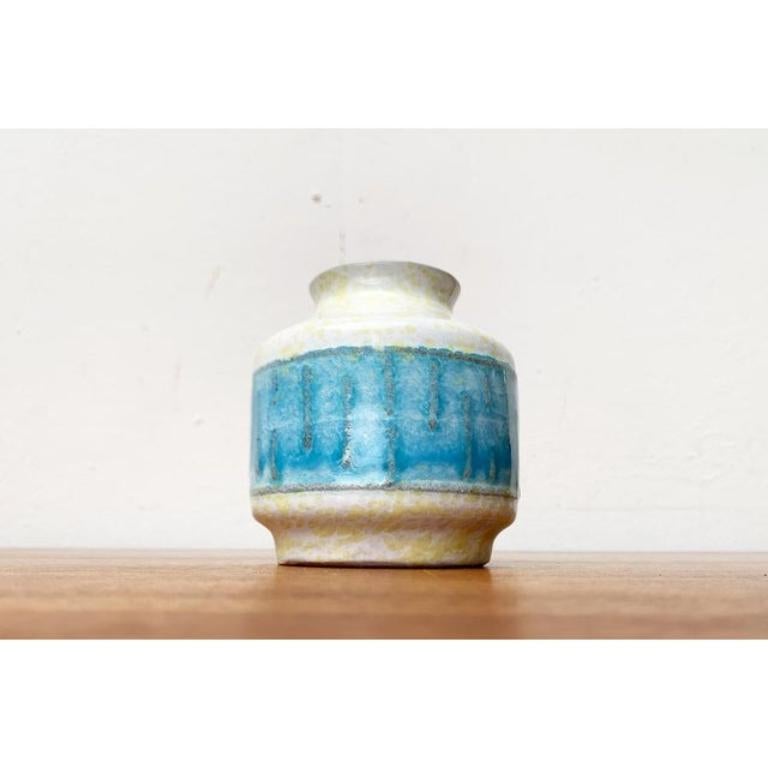 Mid-Century Eastern German GDR Pottery Vase from Strehla Keramik, 1960s, in Very Good conditions. Designed 1960 to 1969 official proof of authenticity such as vintage catalogs, designer records, or other literature sources.

Additional