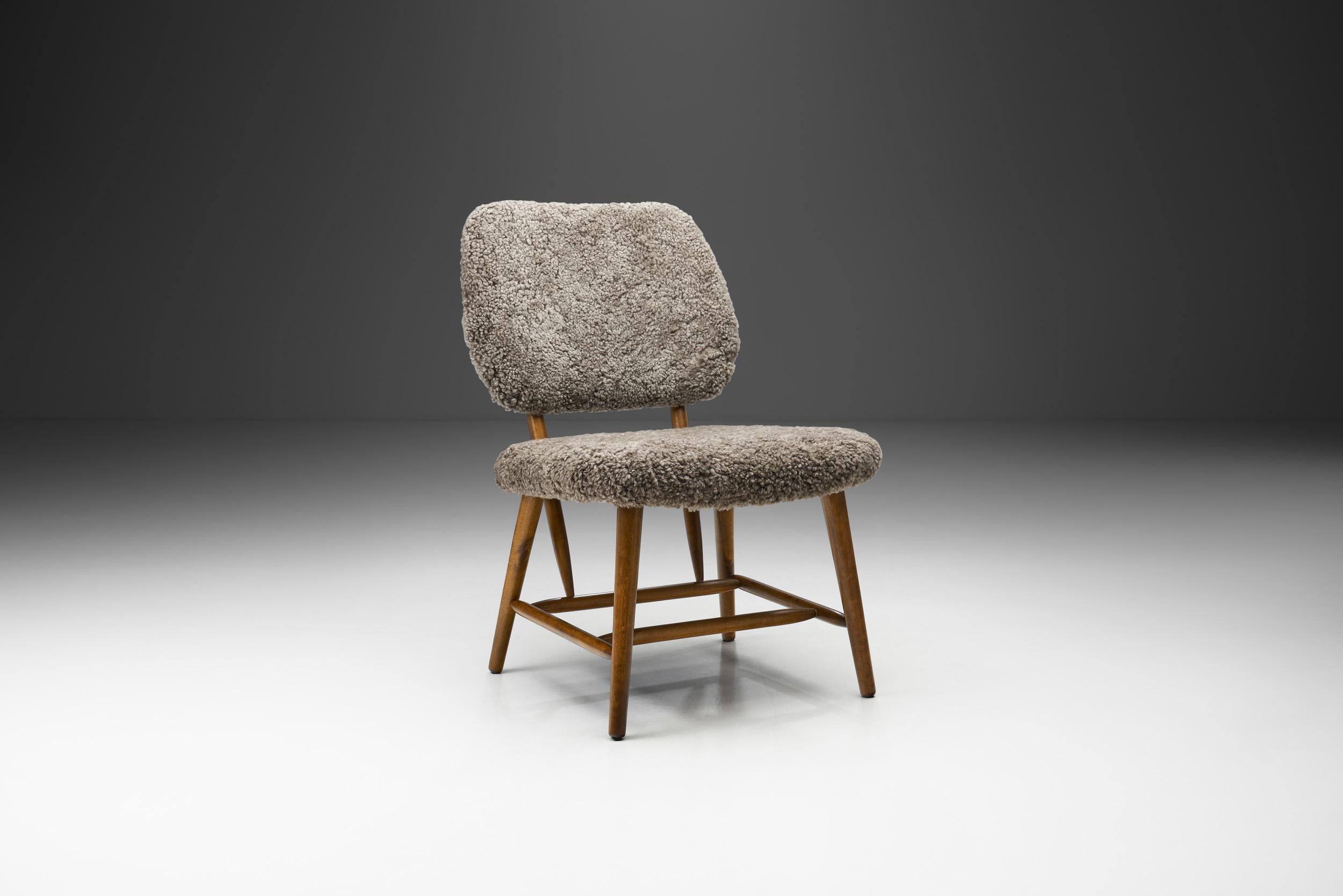 Swedish Mid-Century Easy Chair with Dark Sheepskin Upholstery, Sweden 1950s 