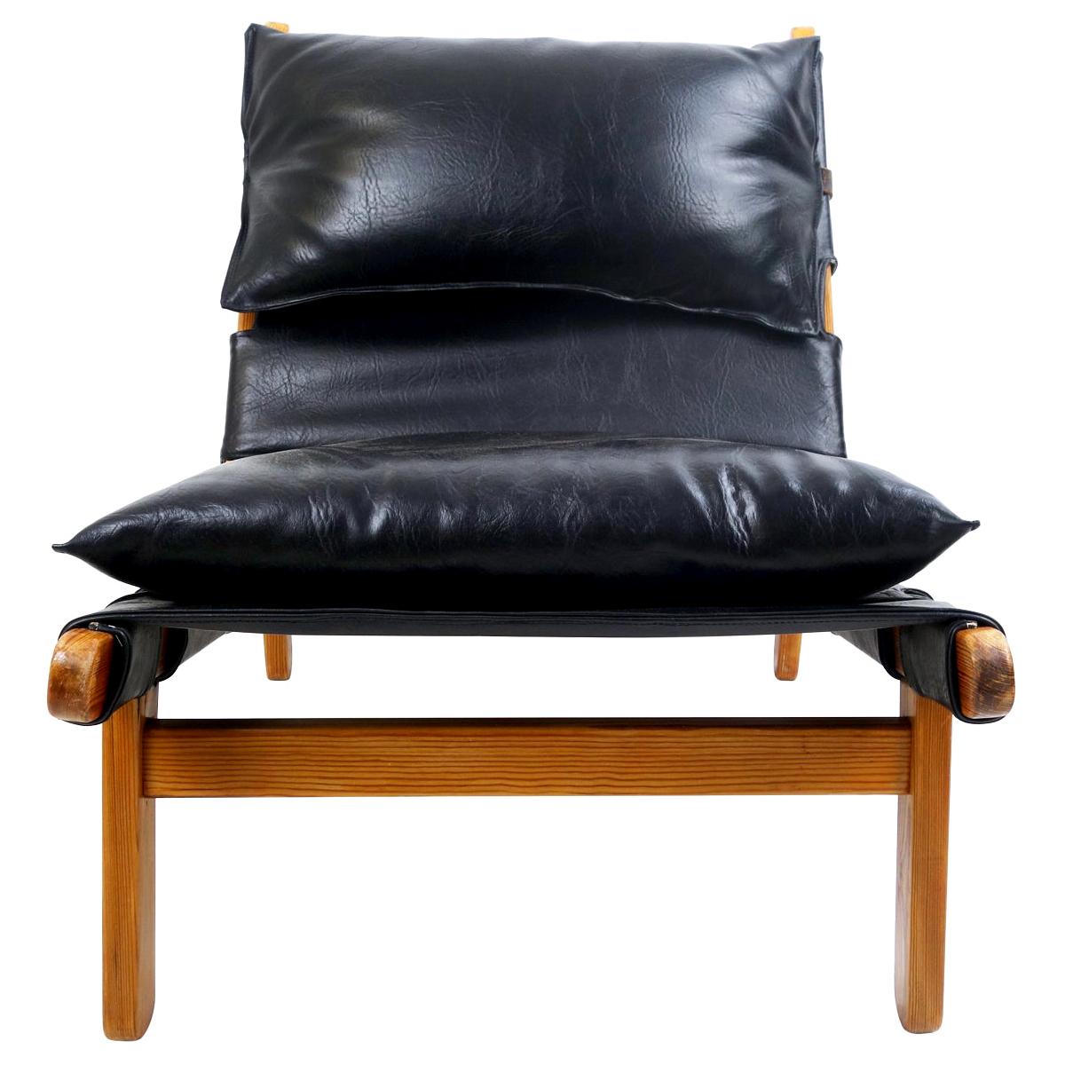 Lounge Chair with Wooden Frame and Brown Leather Cushions For Sale at