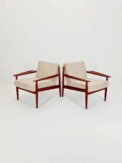 Mid century easy lounge chairs by Arne Vodder  For Glostrup  teak & brass, 1960s
