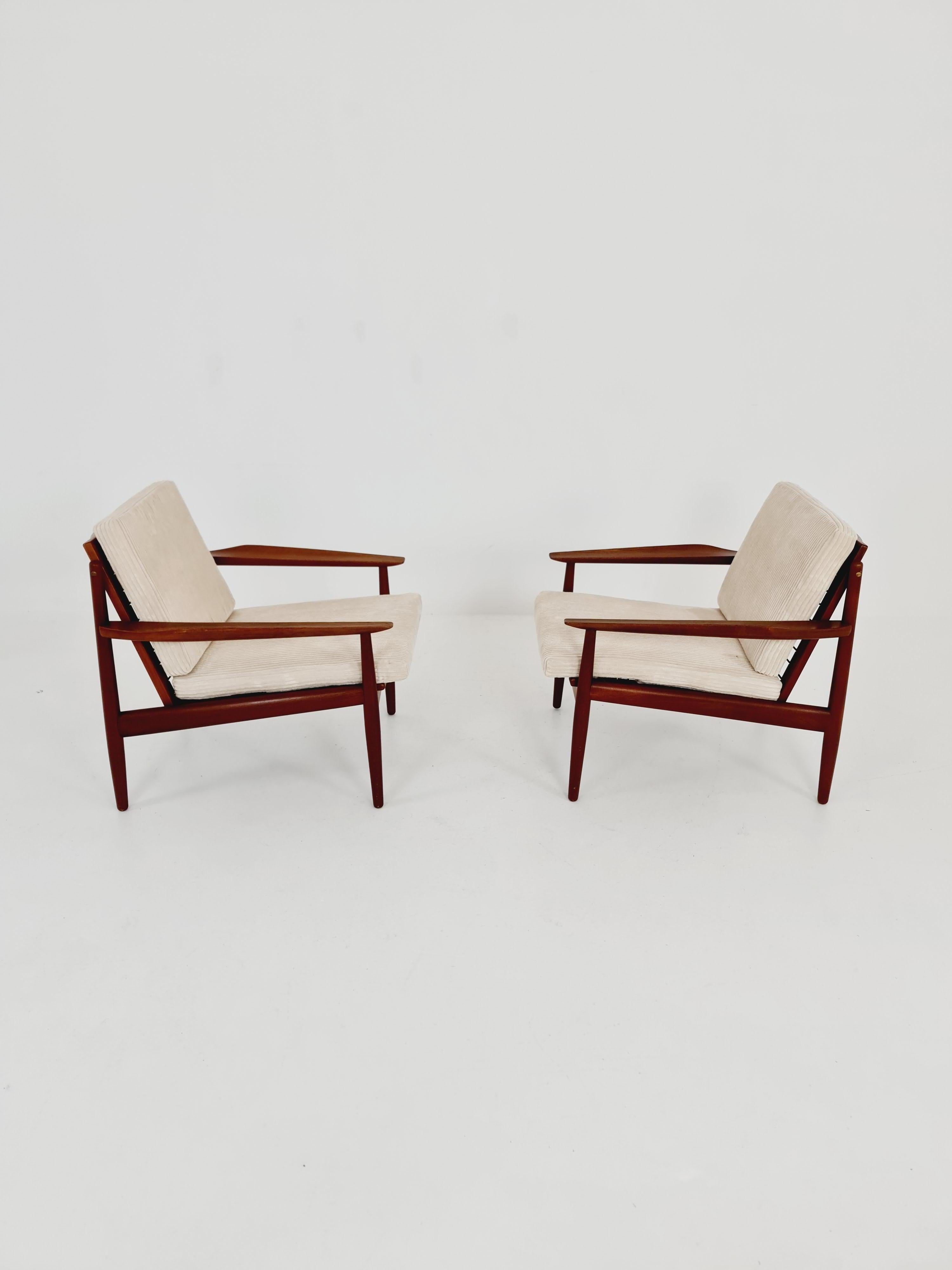 Brass Mid century easy lounge chairs by Grete Jalk, Denmark, teak & brass, Set of 2 For Sale
