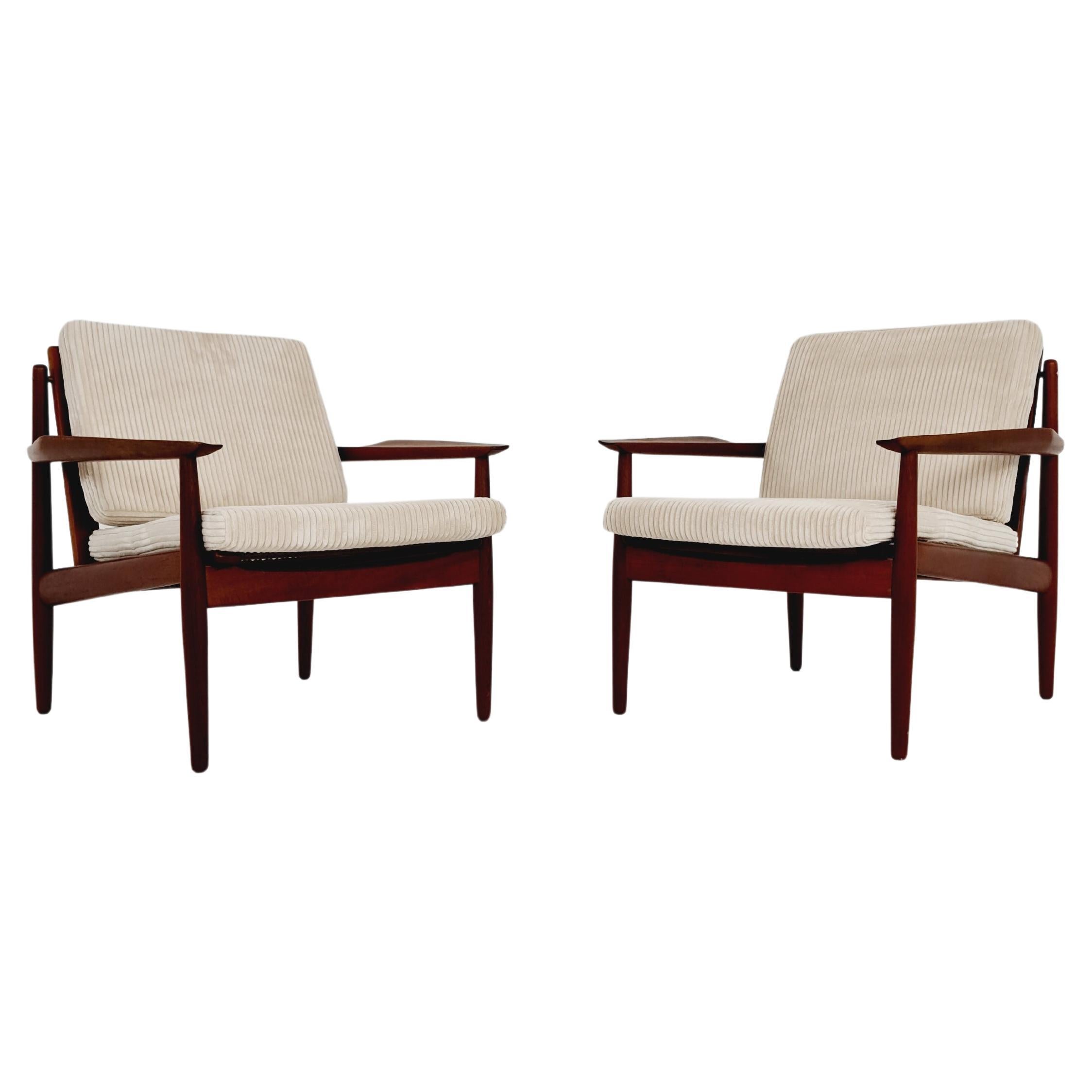 Mid century easy lounge chairs by Grete Jalk, Denmark, teak & brass, Set of 2 For Sale