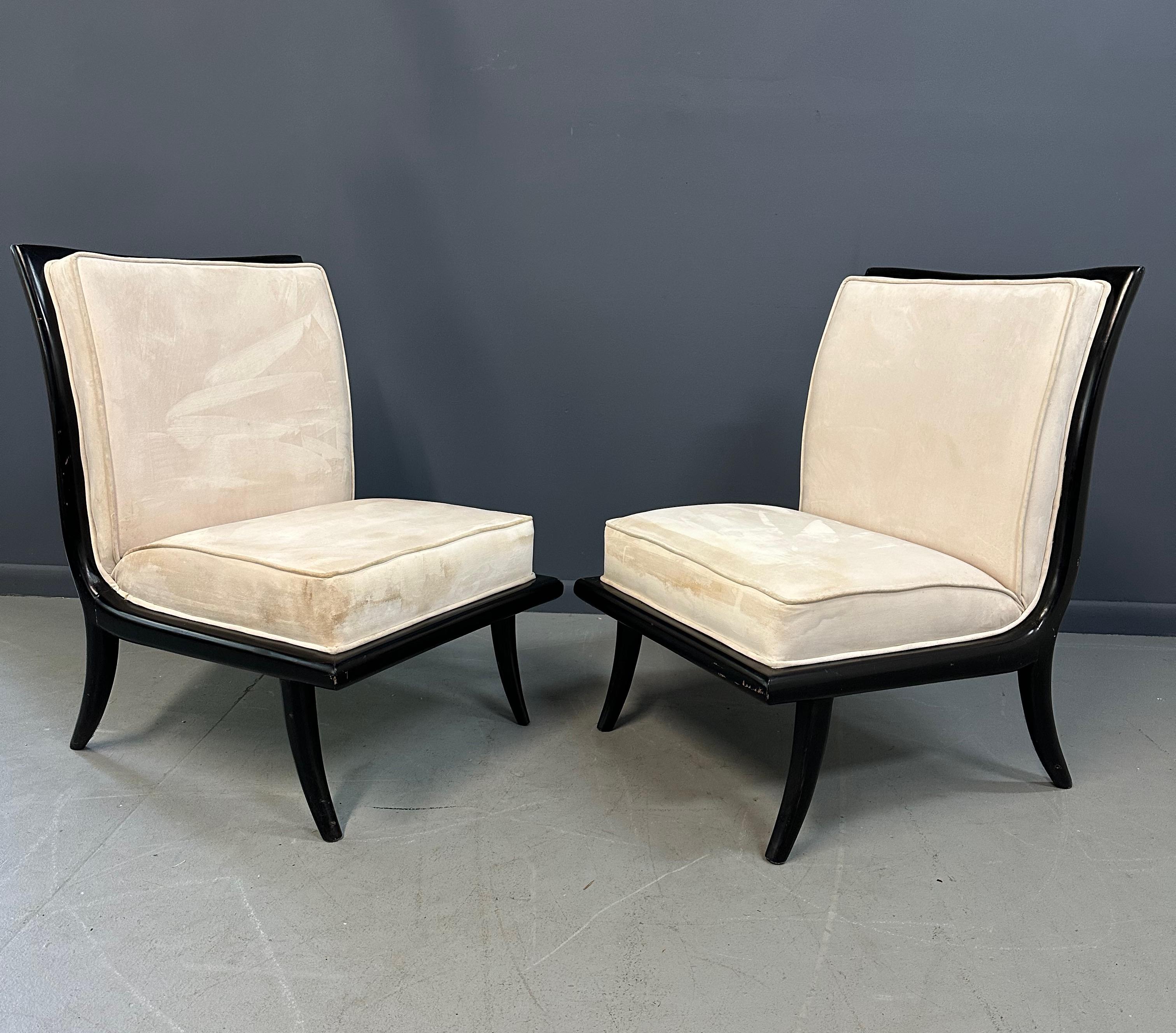 These Mid Century Ebonized Slipper Chairs are crafted in the iconic style of Robsjohn-Gibbings. The ebonized finish adds a touch of elegance and sophistication to any space. Its sleek design and comfortable shape make it a perfect addition to any