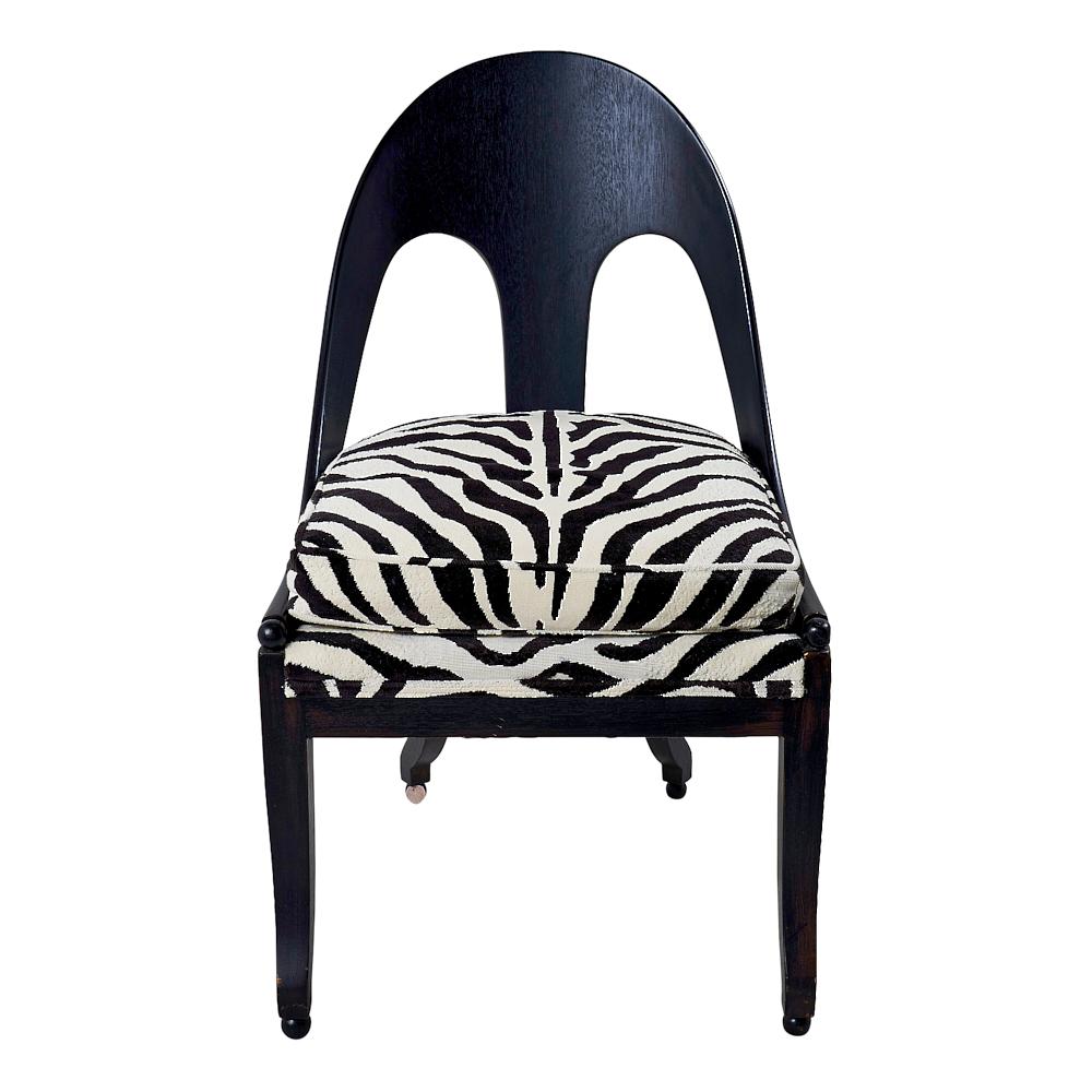 This Mid Century ebonized vintage spoon chair is upholstered in Schumacher Ze'bra Epingle Fabric (43492). 