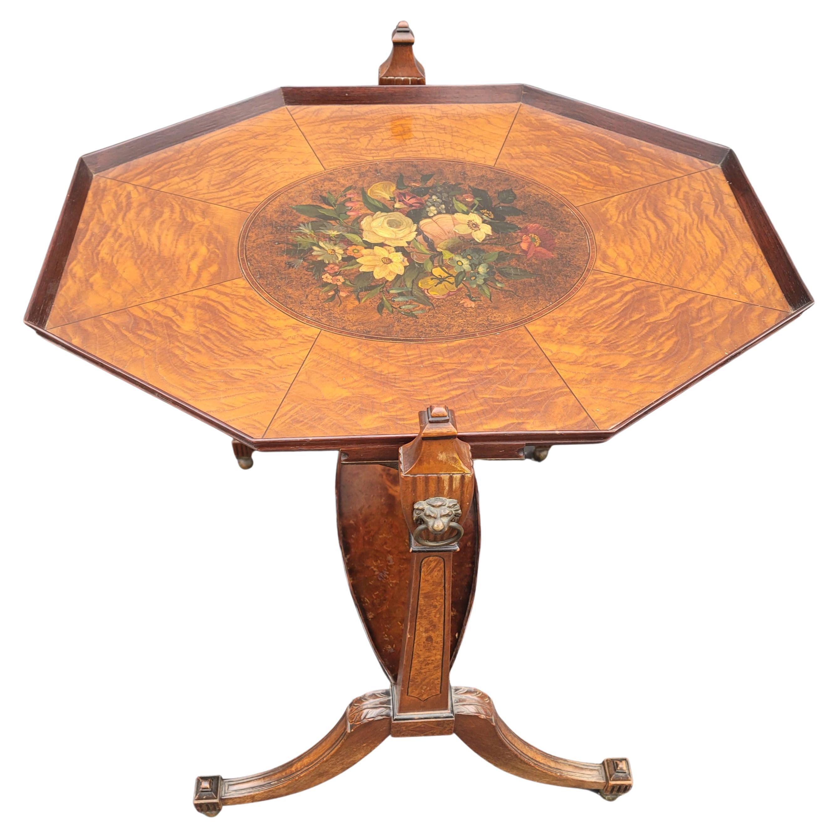 An incredible octogonal mid-century Edwardian style tray table in burl walnut and hand painted. Features a very steady Flip top with wrll functioning locking mechanism. 
Measures 23.5