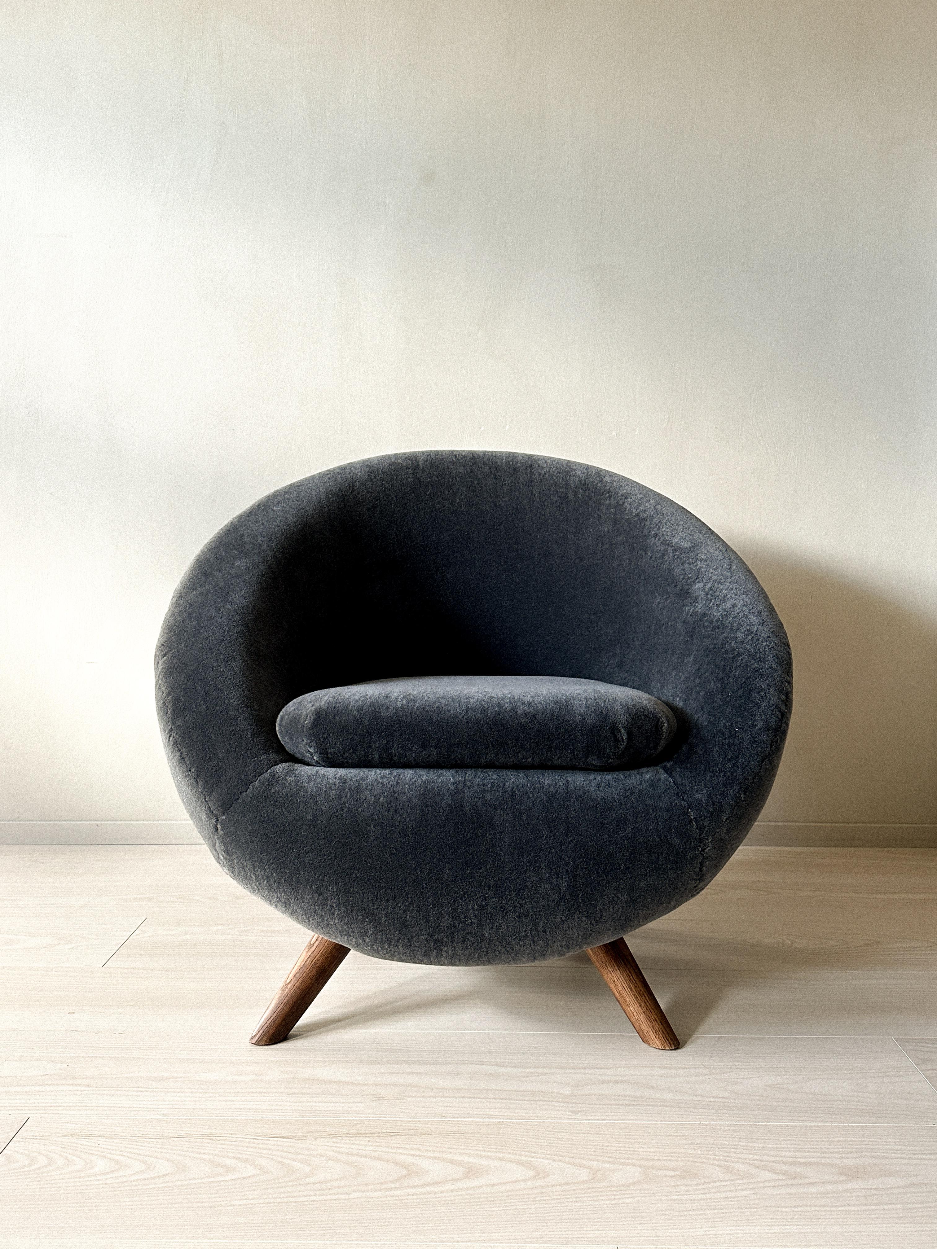 Mid-Century Egg Chair from Norway, Scandinavia, produced circa 1960s. Newly renovated with new oak feet and reupholstered with 100% alpaca wool in a grey color with a hint of blue. 

