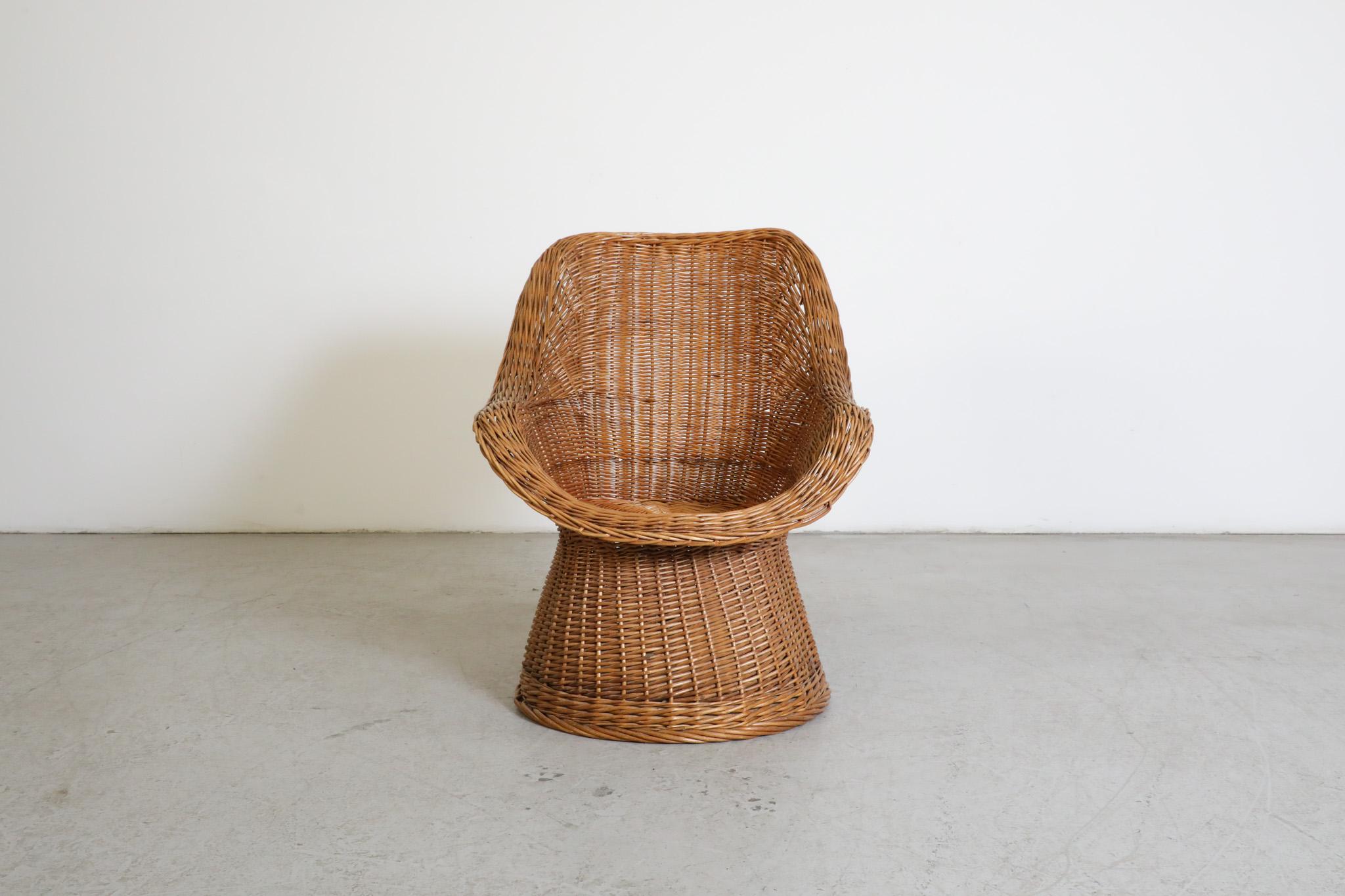 Mid-Century, hand woven rattan 'Peacock' style lounge chair. Attributed to Dutch Mid-Century great Dirk van Sliedregt but reminiscent of the work of Egon Eiermann. This high back  lounge chair is perfect for indoor or outdoor use (when stored under