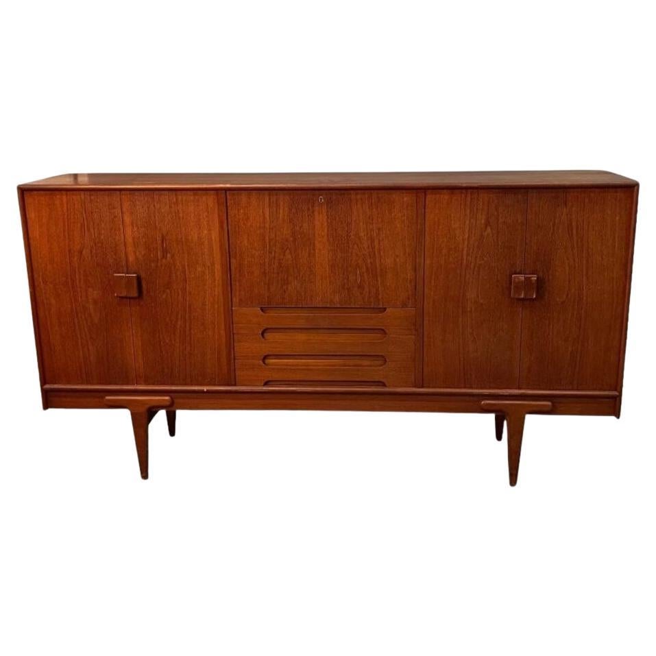 Mid-Century Ejvind A. Johanson teak high sideboard with middle desk section and 