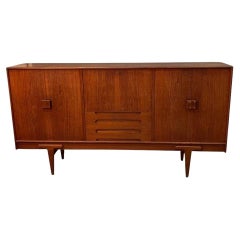 Mid-Century Ejvind A. Johanson teak high sideboard with middle desk section and 