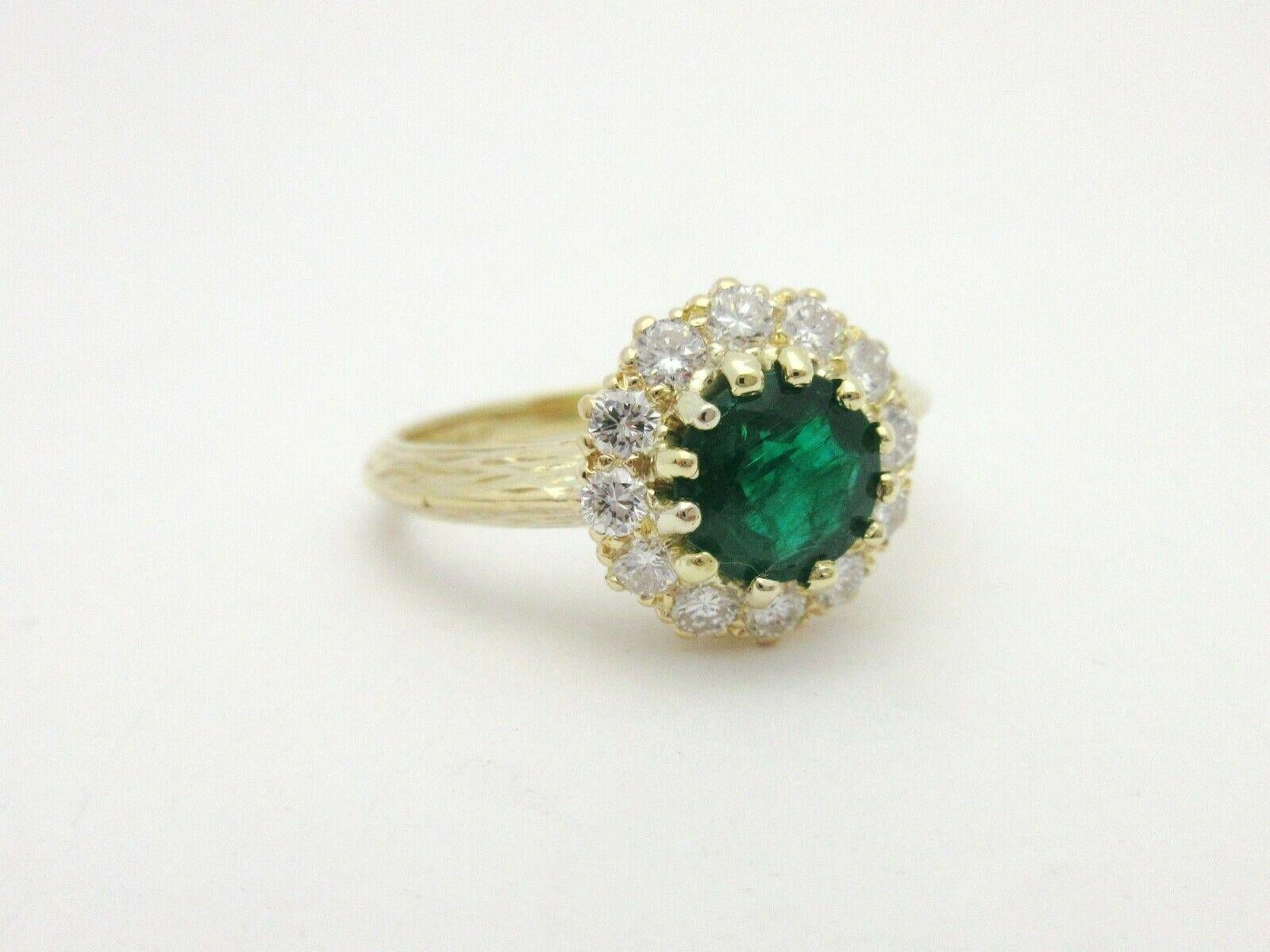 This beautifully made statement ring is a testament to fine work with gemstone flair honoring May birthdays or anyone with an affinity for emeralds.

The ring, crafted entirely in 18k yellow gold, features a stunning 1.5ct. emerald surrounded by