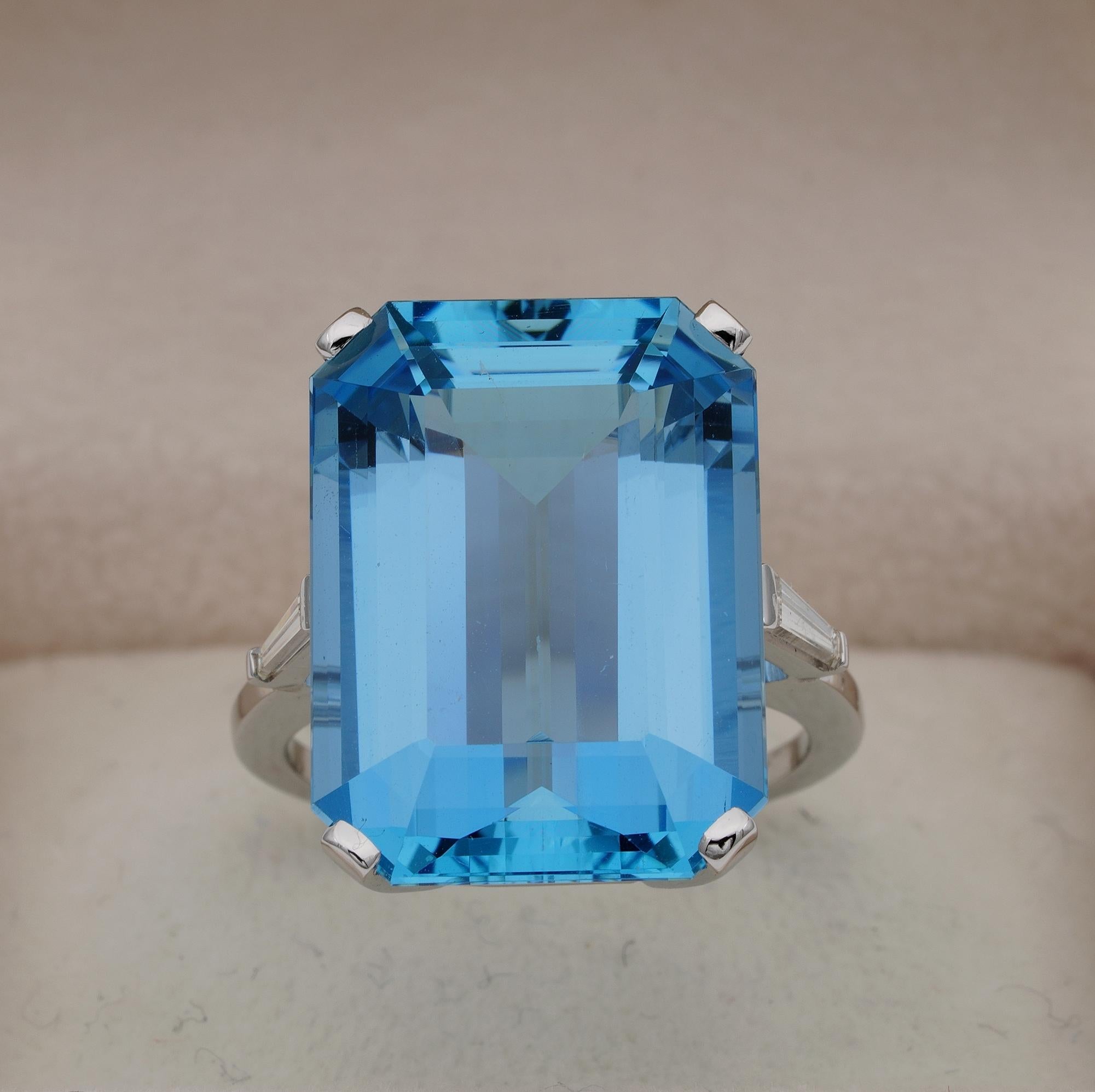 The Dreaming Blue

Striking large sized mid century Aquamarine ring – 1960 ca
Beautiful simple design exalting the rare colour of the Aquamarine which alone makes a true statement
Emerald cut natural Aquamarine is the focus - excellent emerald cut