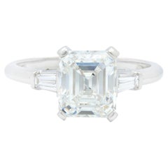 Mid-Century Emerald Cut Diamond Platinum Three Stone Vintage Engagement Ring